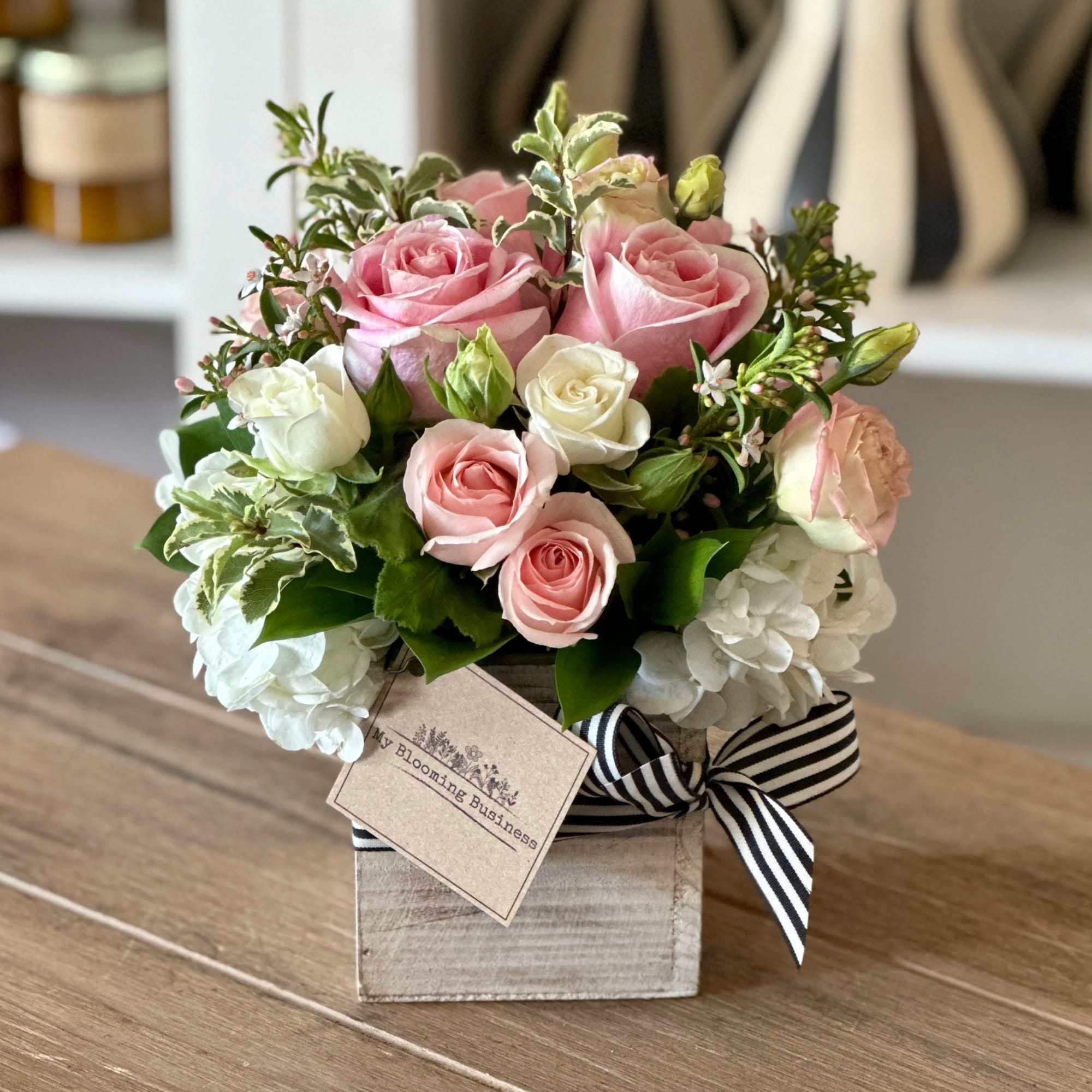 Soft, elegant, and effortlessly charming, this sweet floral arrangement features lush white, photo 2 of 3
