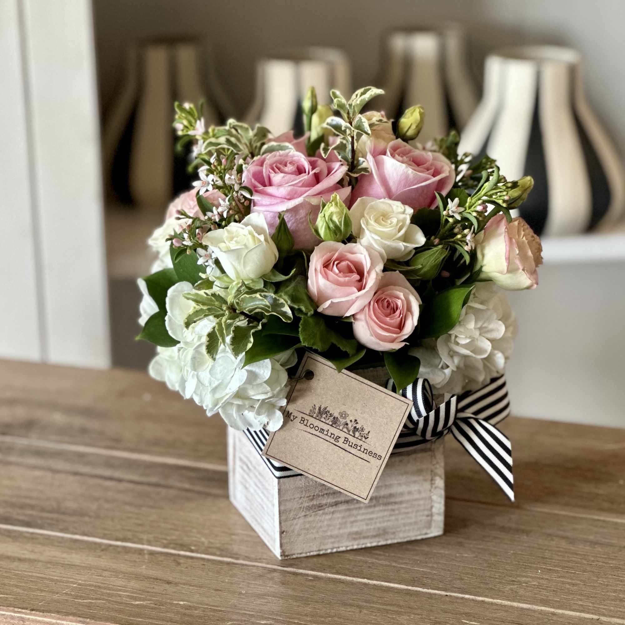 Soft, elegant, and effortlessly charming, this sweet floral arrangement features lush white, photo 3 of 3