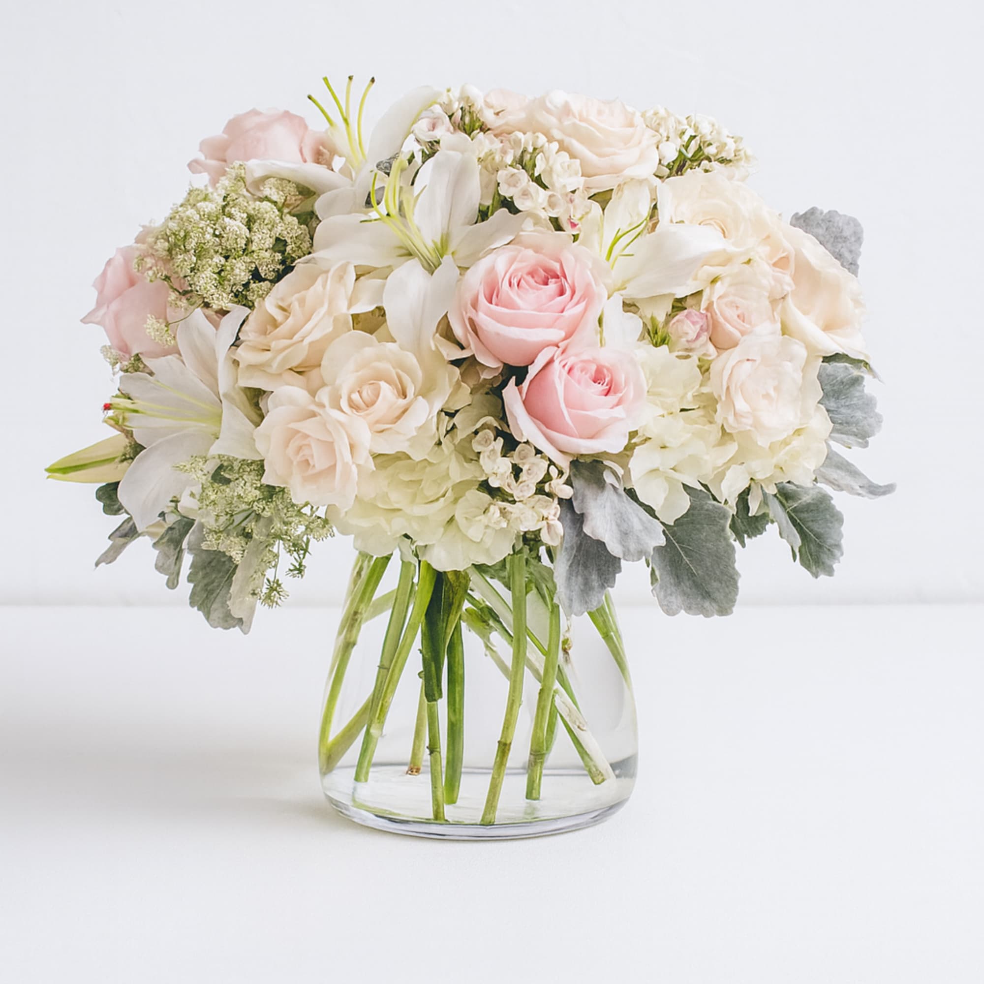 A whisper-quiet affirmation of love. Subtle shadings of pink and white roses