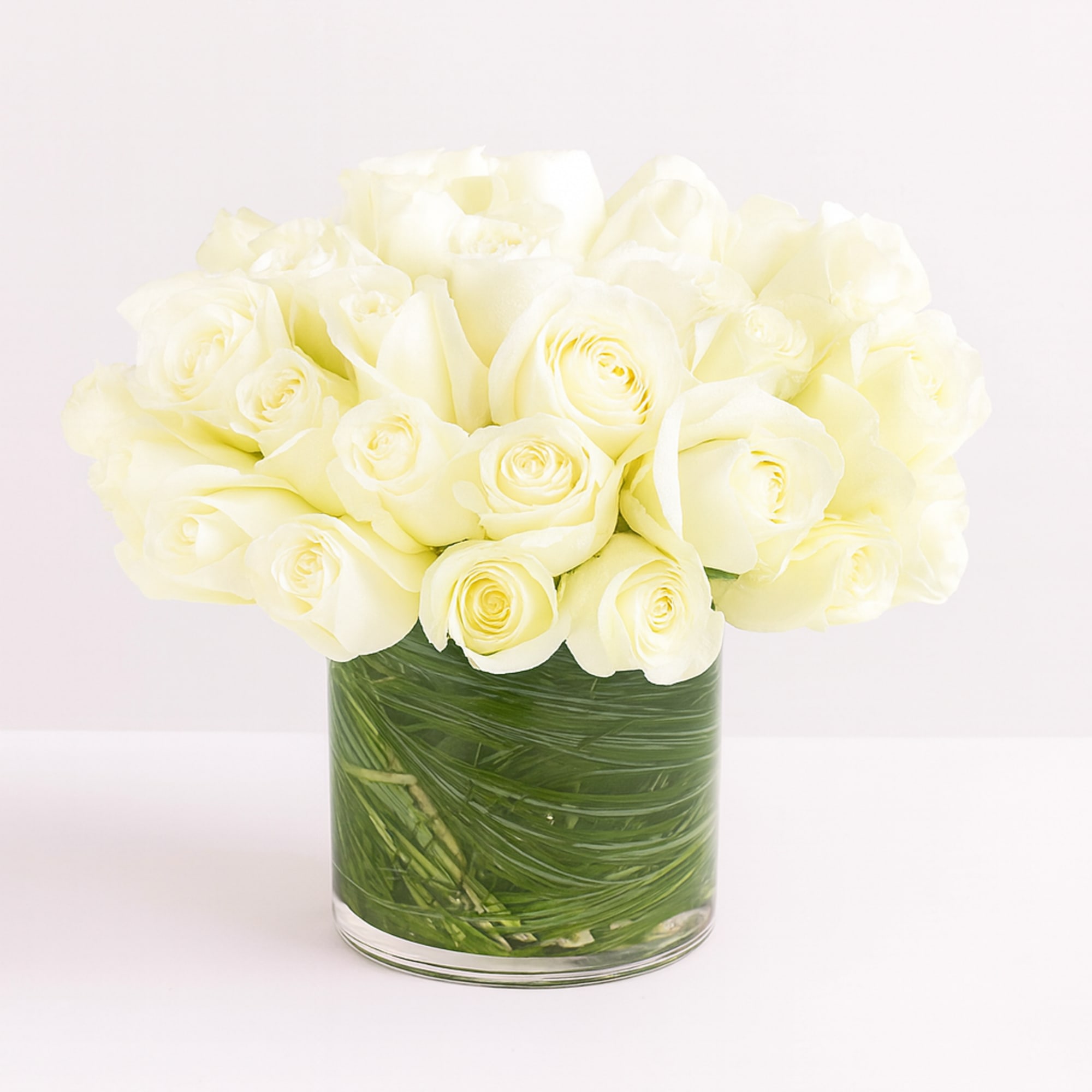 Make a bold statement with this elegantly simple design. White roses symbolize