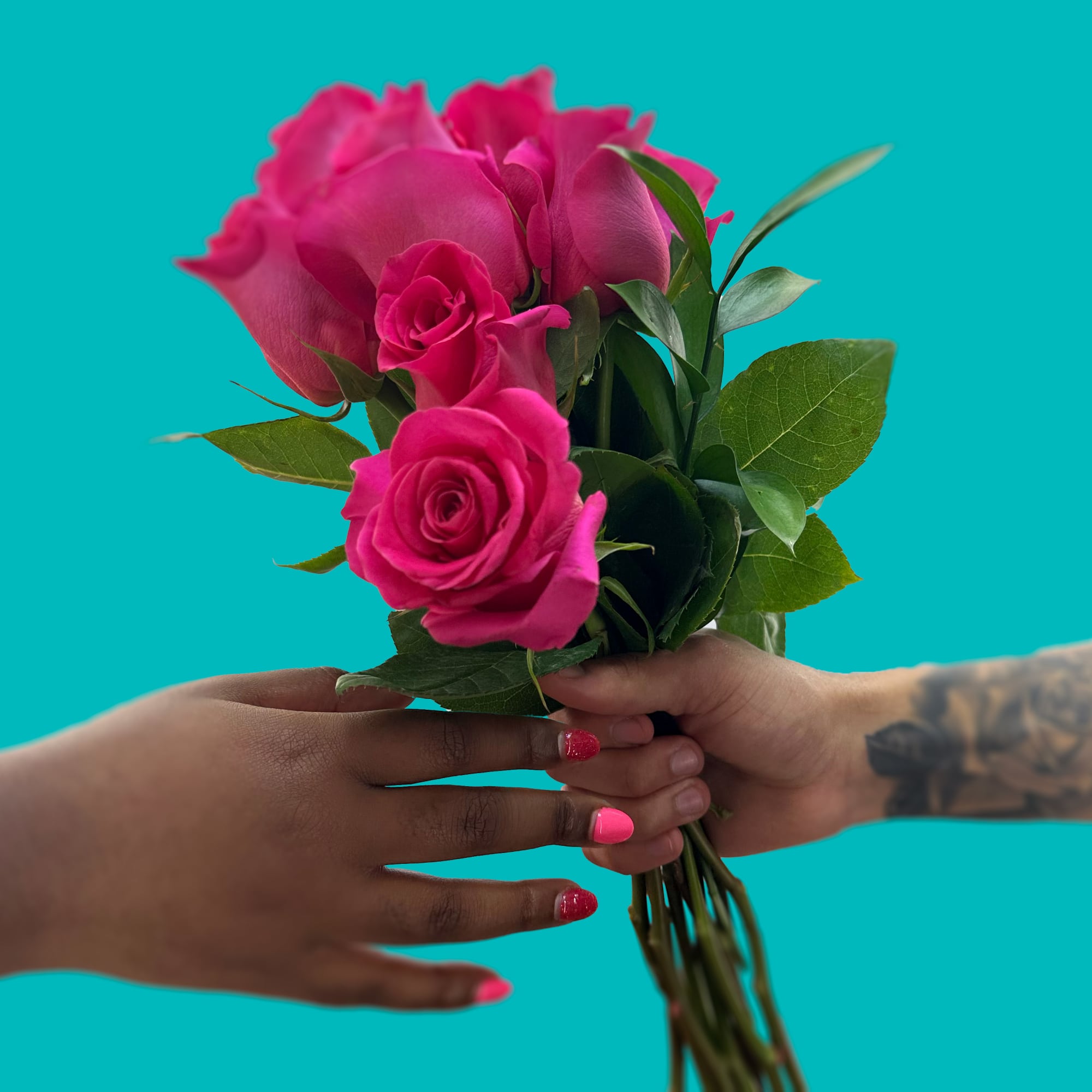 Vivid hot pink roses cluster into a compact, hand-tied bouquet that reads, photo 2 of 2