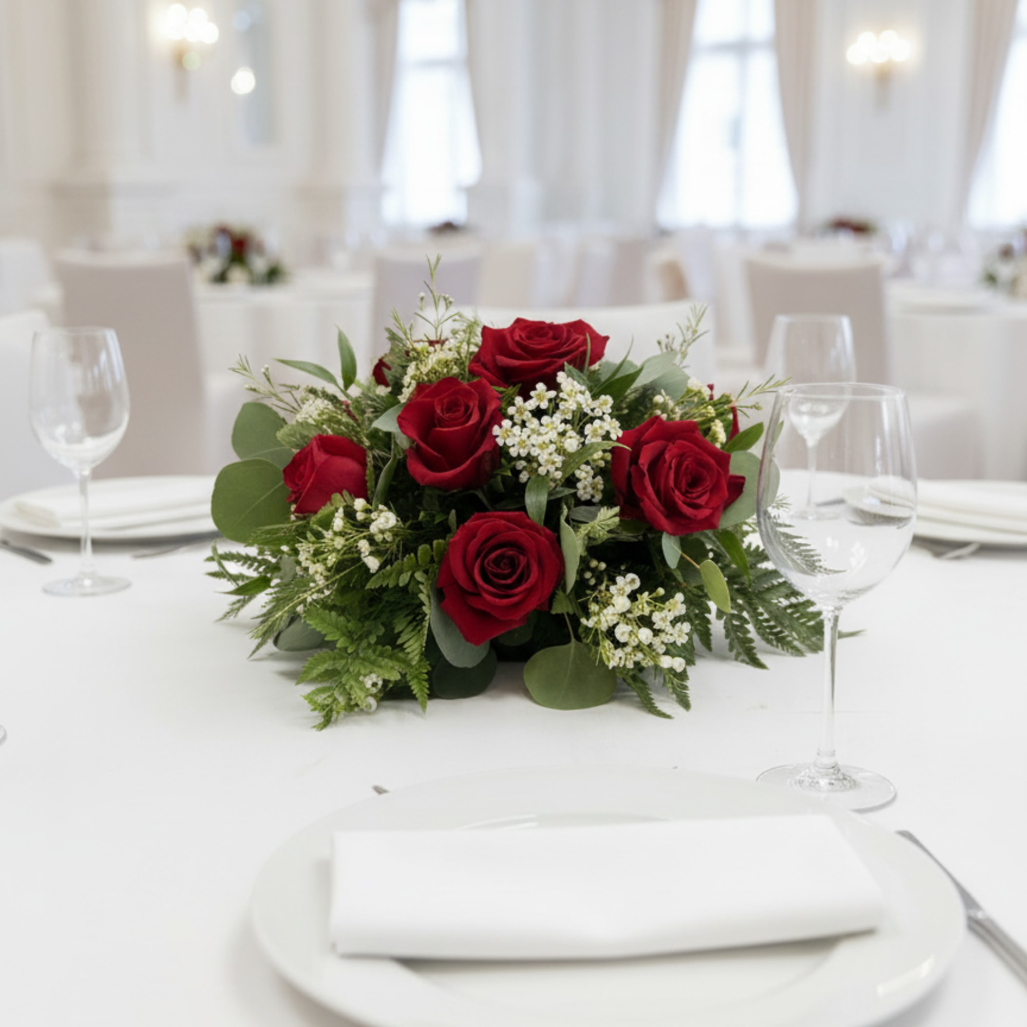 Deep clusters of deep red roses form the heart of this low, photo 2 of 2