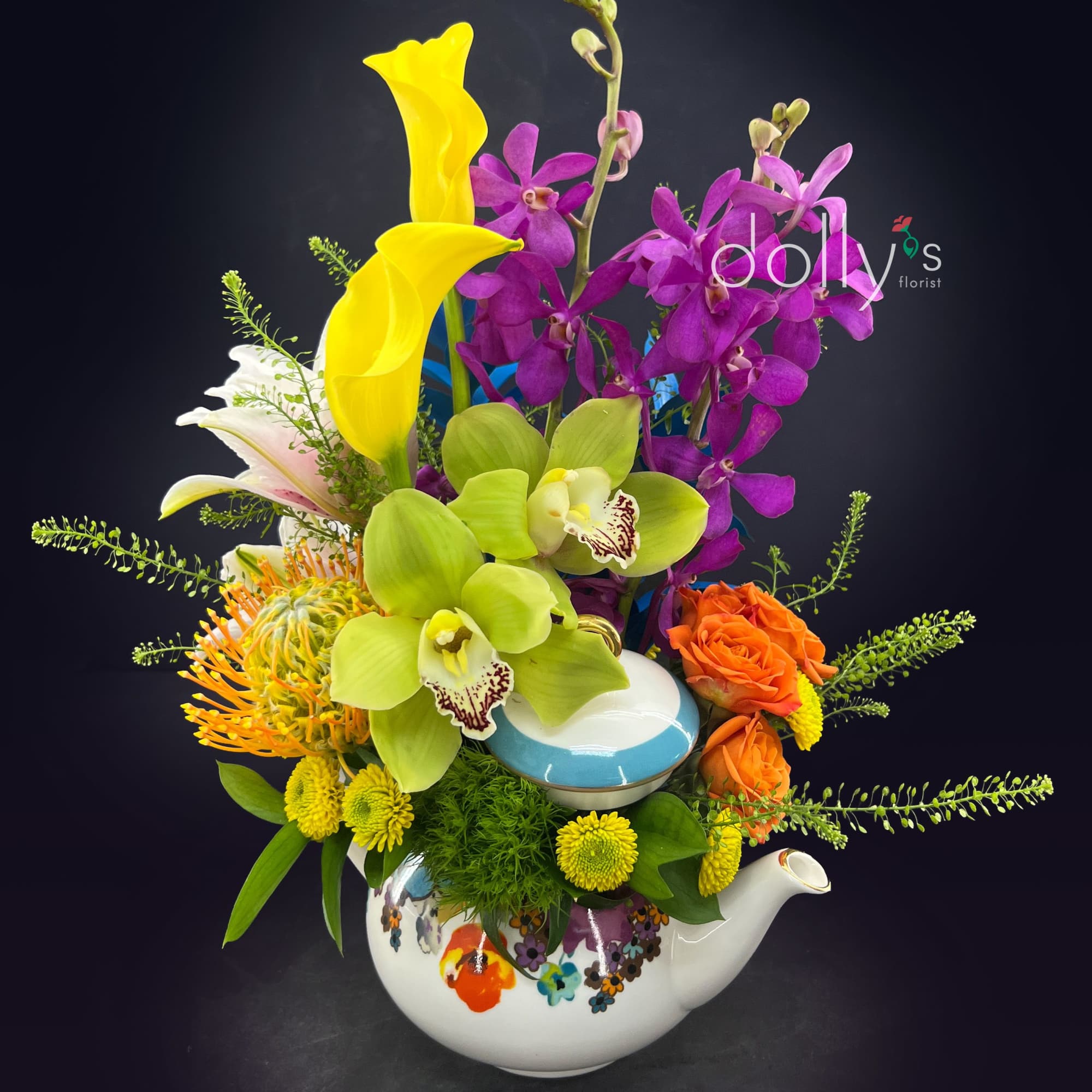 Tall purple and lime-green orchids and bright yellow calla lilies spill from