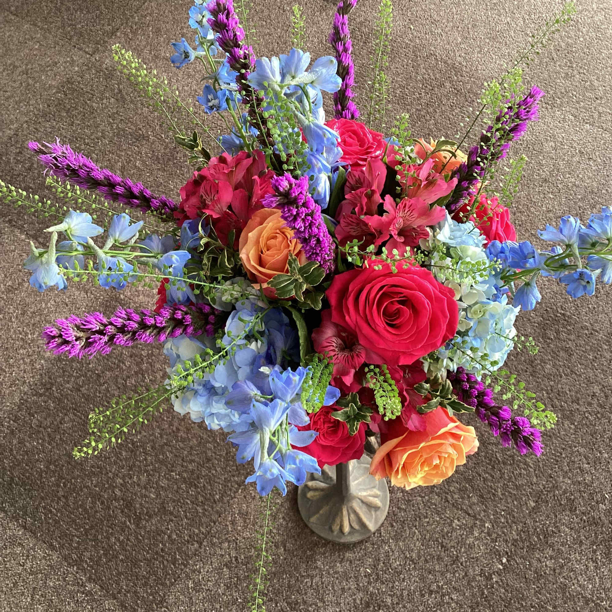 Stunning mix of pale blue hydrangeas, sky blue delphinium, hot pink and, photo 3 of 3