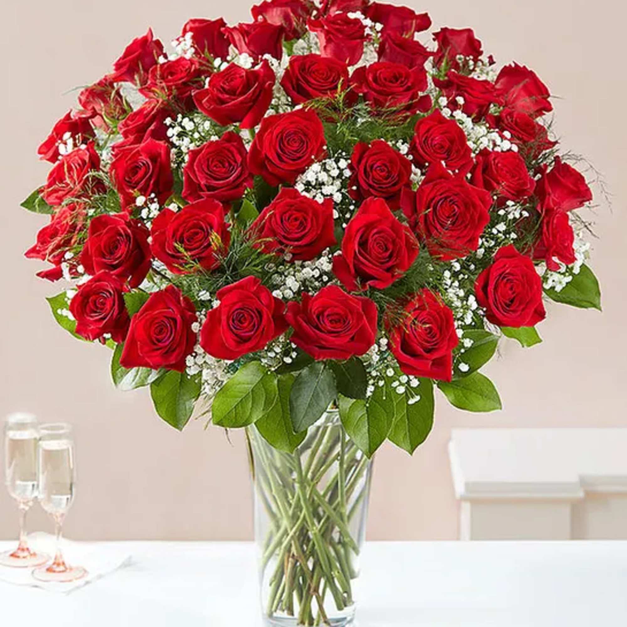 Bouquet of red roses in a clear glass vase
