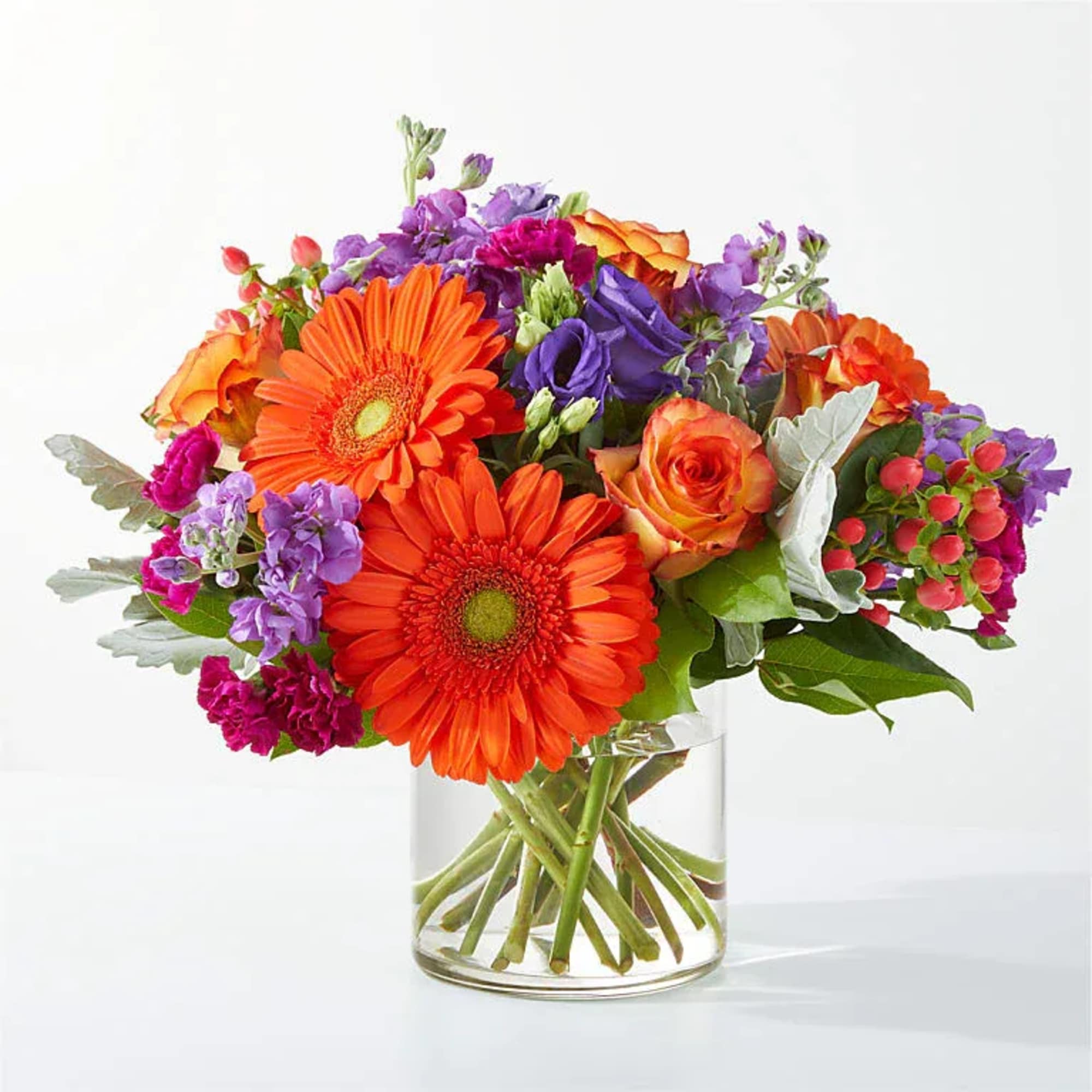 Bright mixed bouquet in a clear glass vase