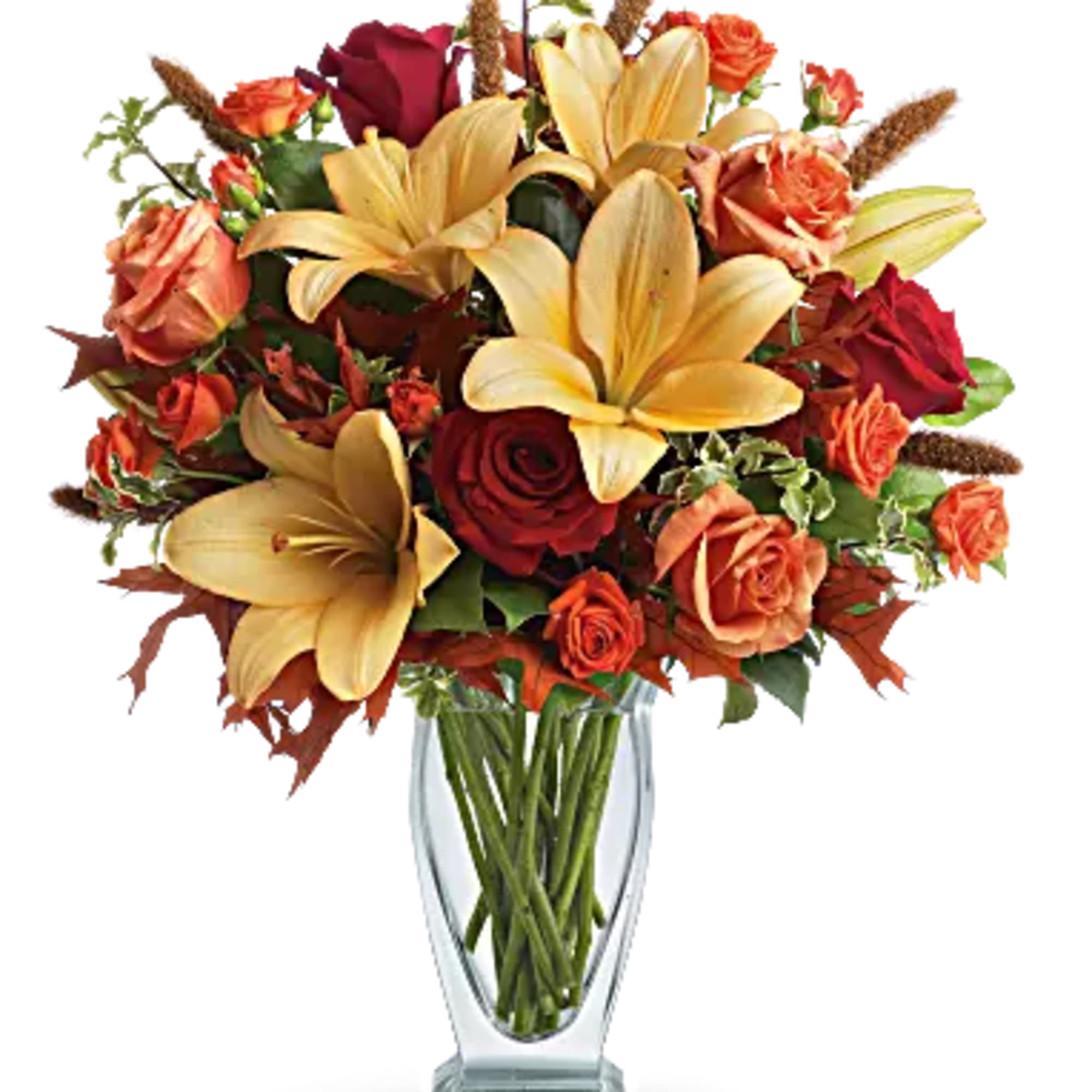 Roses, lilies and oak leaves create a fantasy of fall flowers. Send, photo 2 of 3