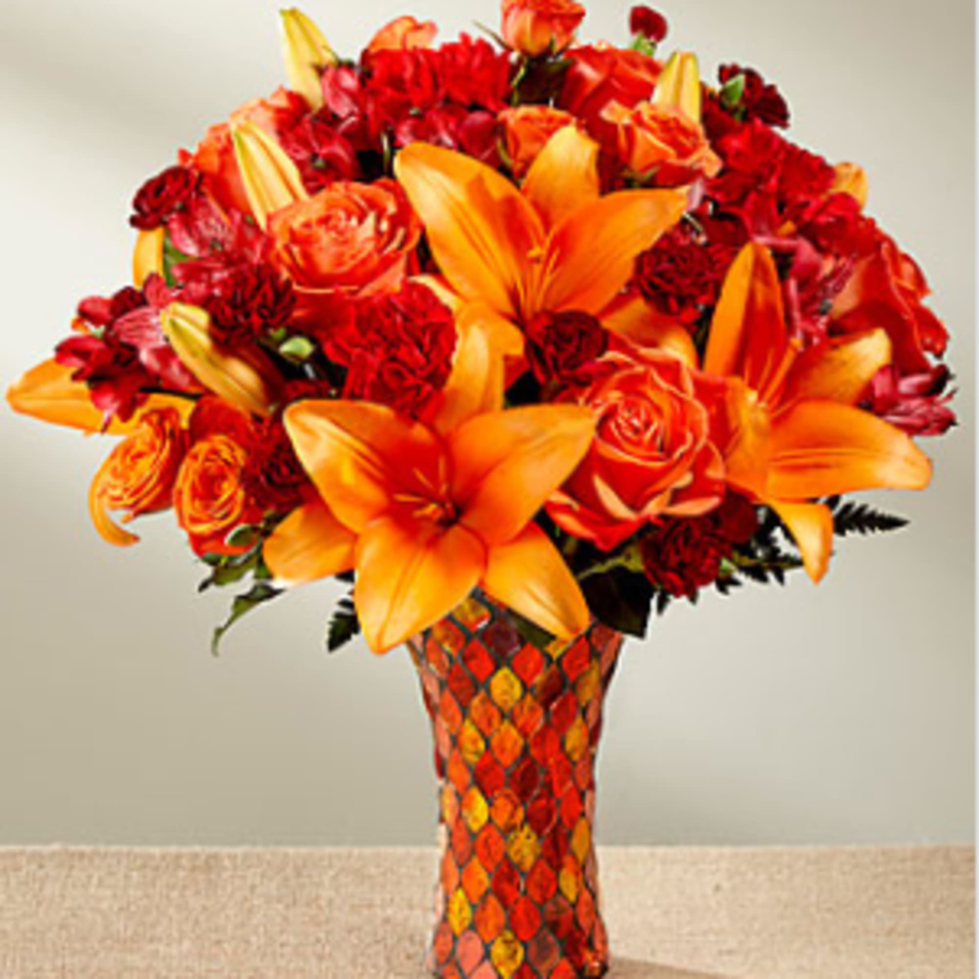 Saturated in the alluring hues of the harvest season, this fresh flower, photo 3 of 3