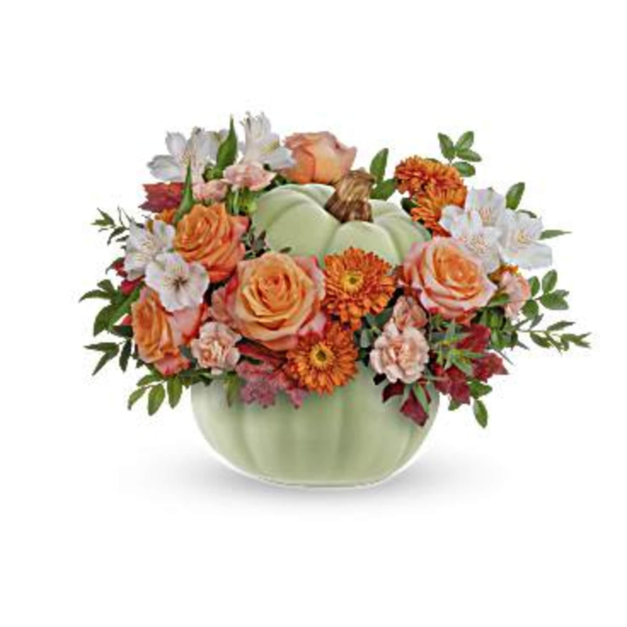Teleflora's Whimsy Pumpkin Bouquet offers a stylish option for your autumn table.