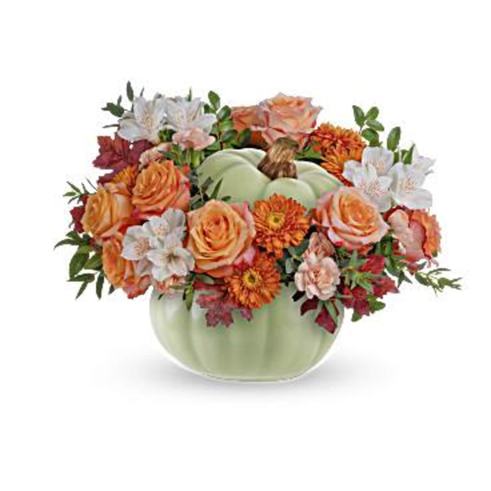 Teleflora's Whimsy Pumpkin Bouquet offers a stylish option for your autumn table.