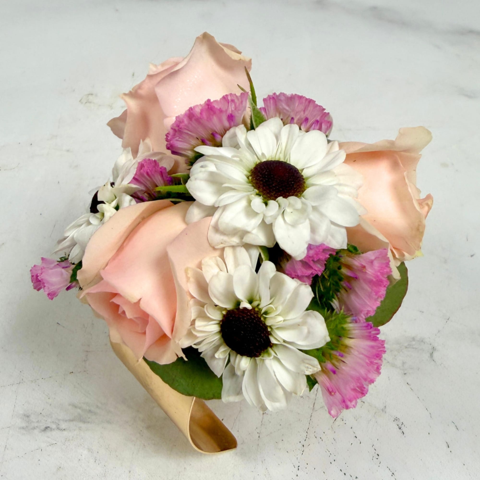 Pale, petite blush spray roses clustered with black and white yin yang, photo 2 of 4