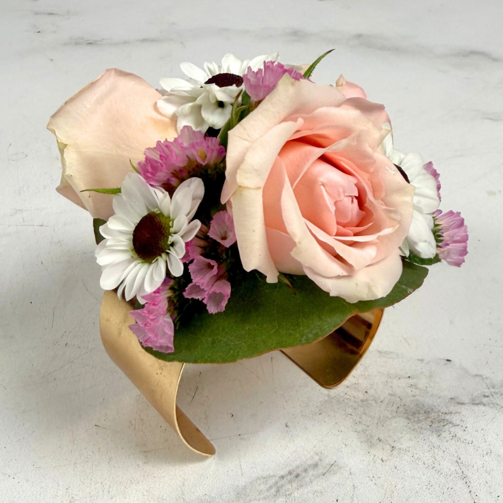 Pale, petite blush spray roses clustered with black and white yin yang, photo 4 of 4