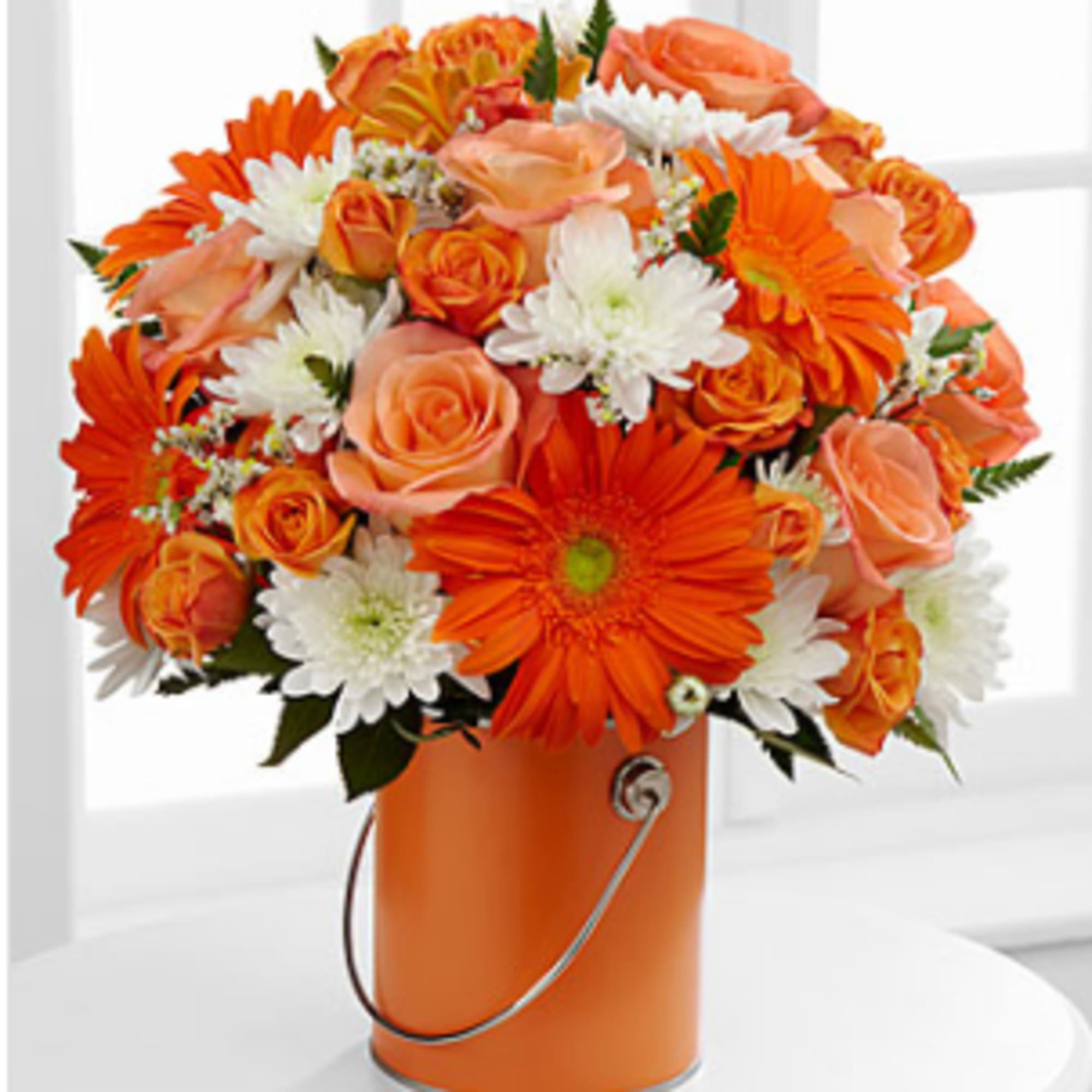 Perfect orange roses, orange gerbera daisies and orange spray roses pop against, photo 3 of 3