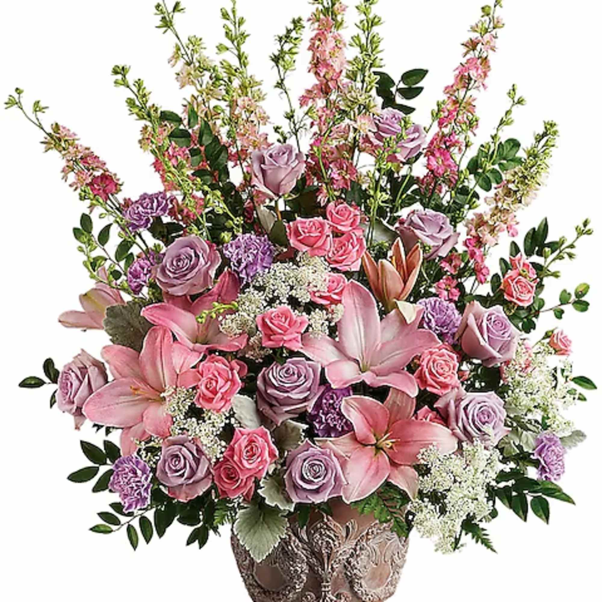 Pink and lavender floral arrangement in a decorative vase