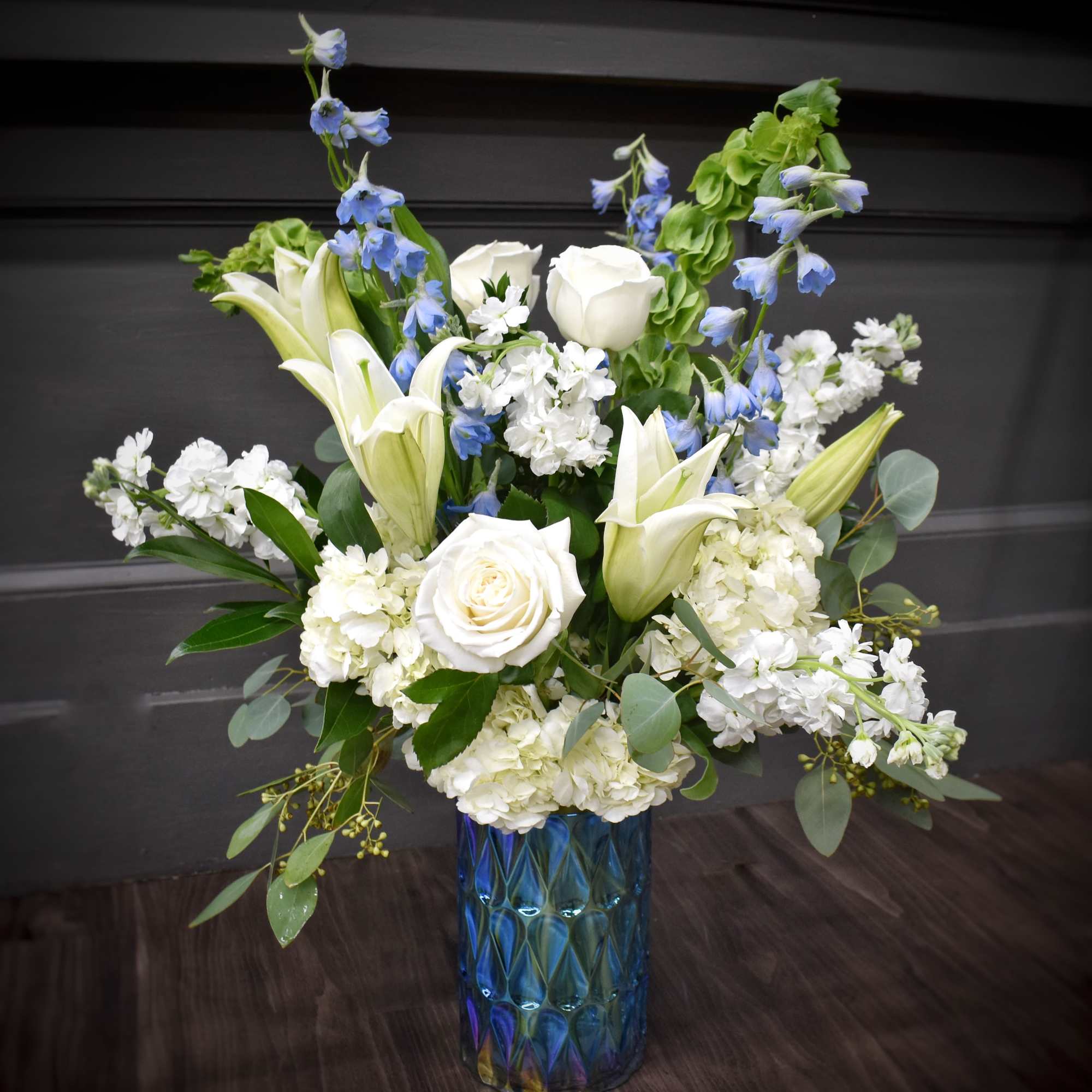 Blue Skies greets the recipient with a calm, airy palette of white