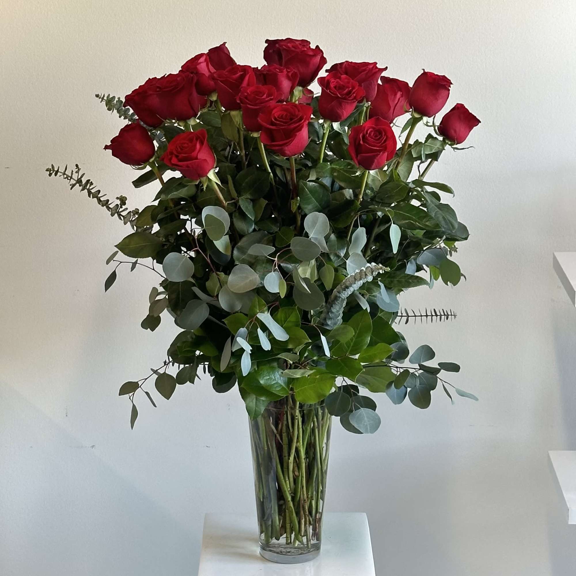 Indulge in timeless romance with the Super Long Stemmed Red Roses bouquet