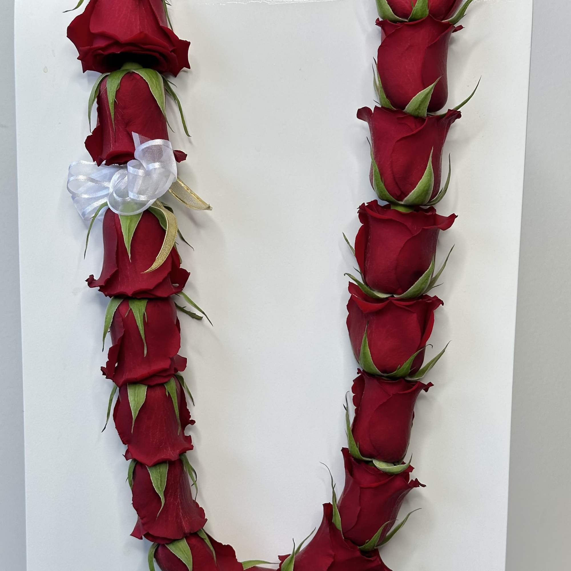 Celebrate a meaningful milestone with a stunning rose graduation lei, handcrafted in-house, photo 2 of 2