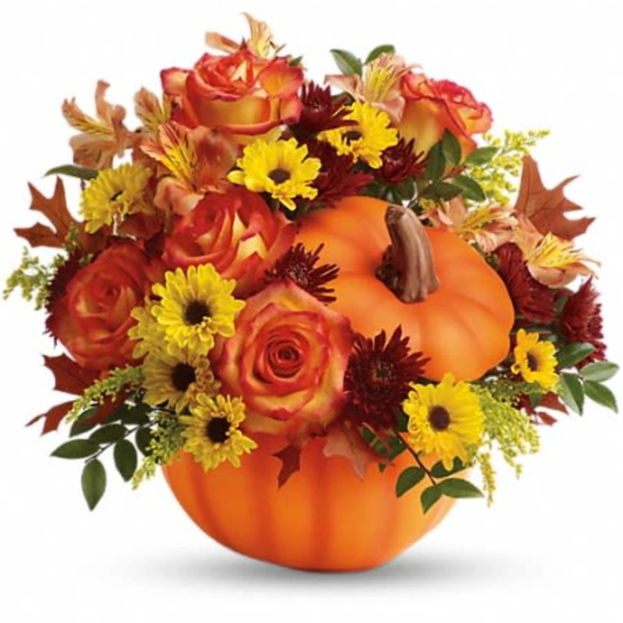 Orange pumpkin centerpiece with roses and yellow daisies