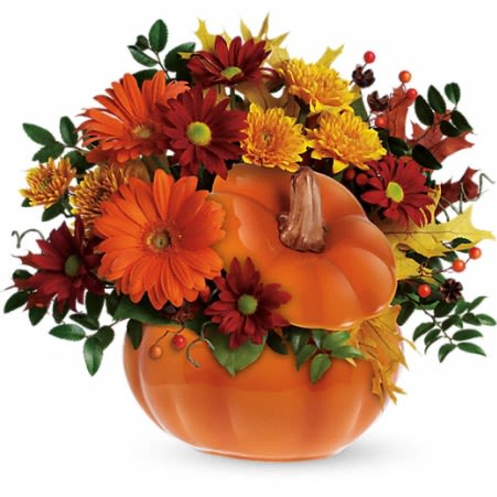 Fall bouquet in a pumpkin-shaped container with orange and red flowers