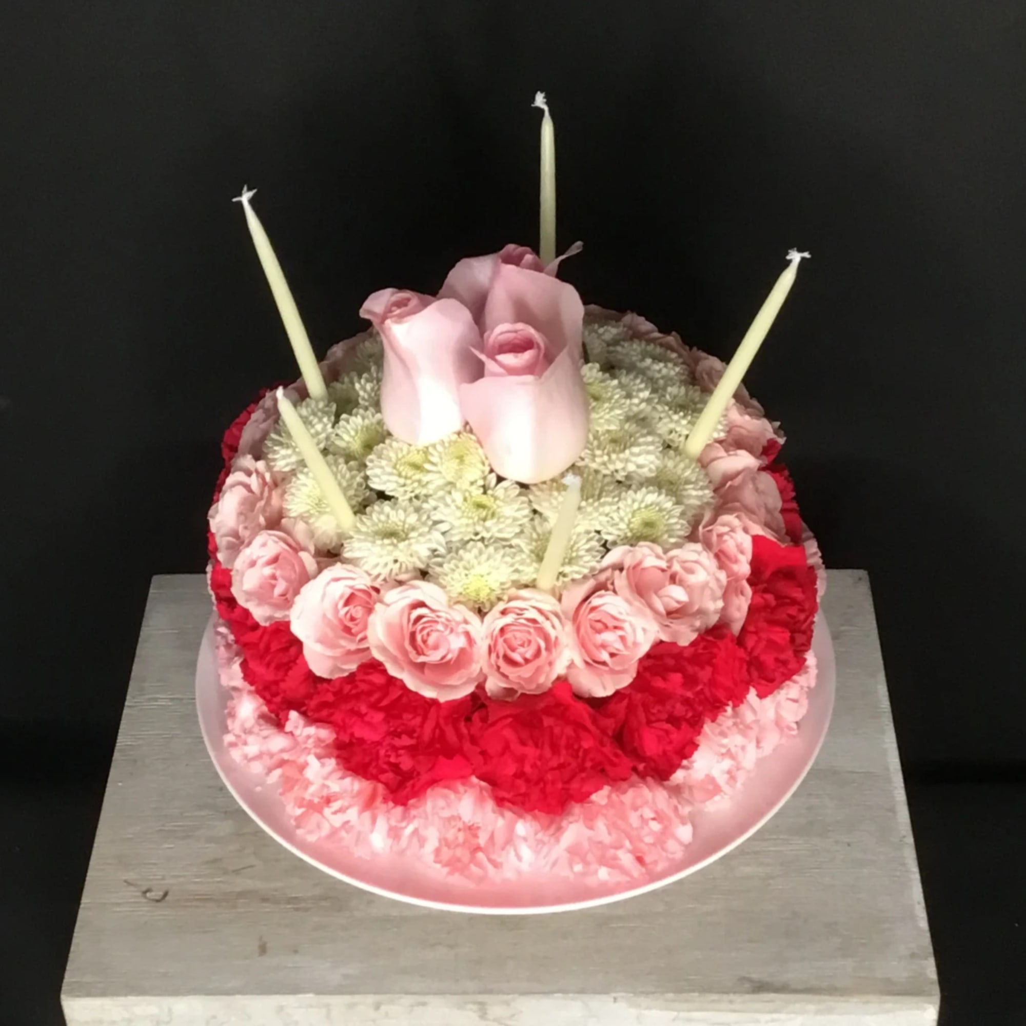 They'll never forget this incredible birthday surprise! Spray roses, pompons and mums