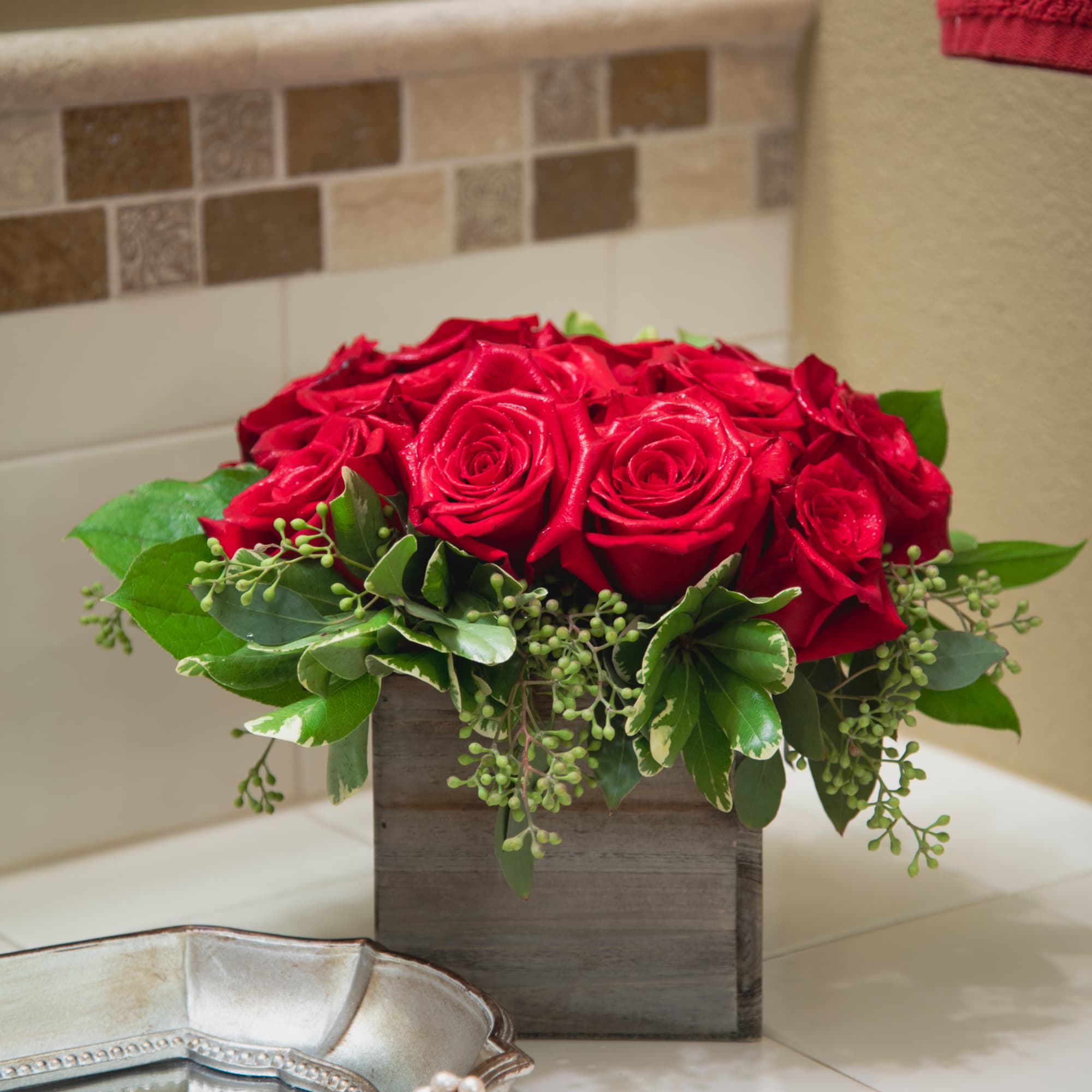 12 rich red roses in a rustic wood box will have your