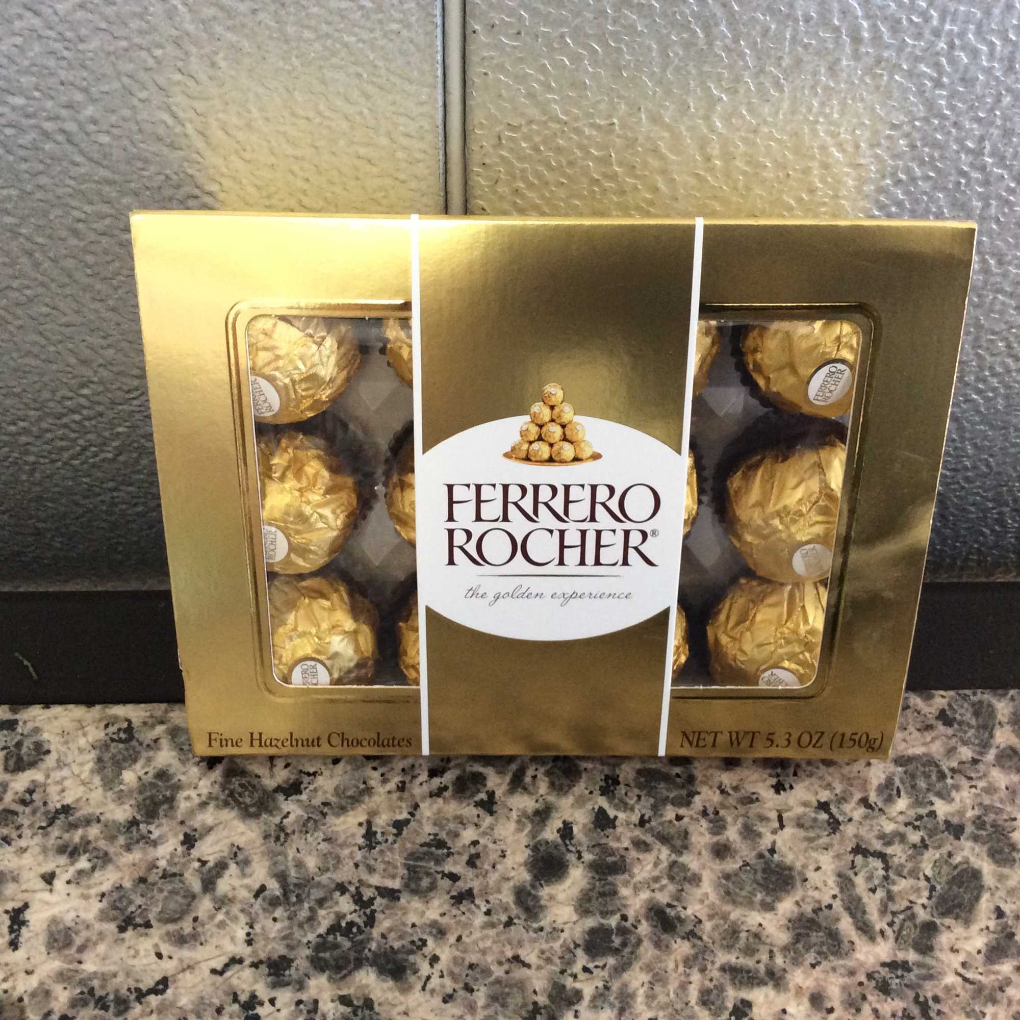 Box of Ferrero Rocher chocolates on a countertop