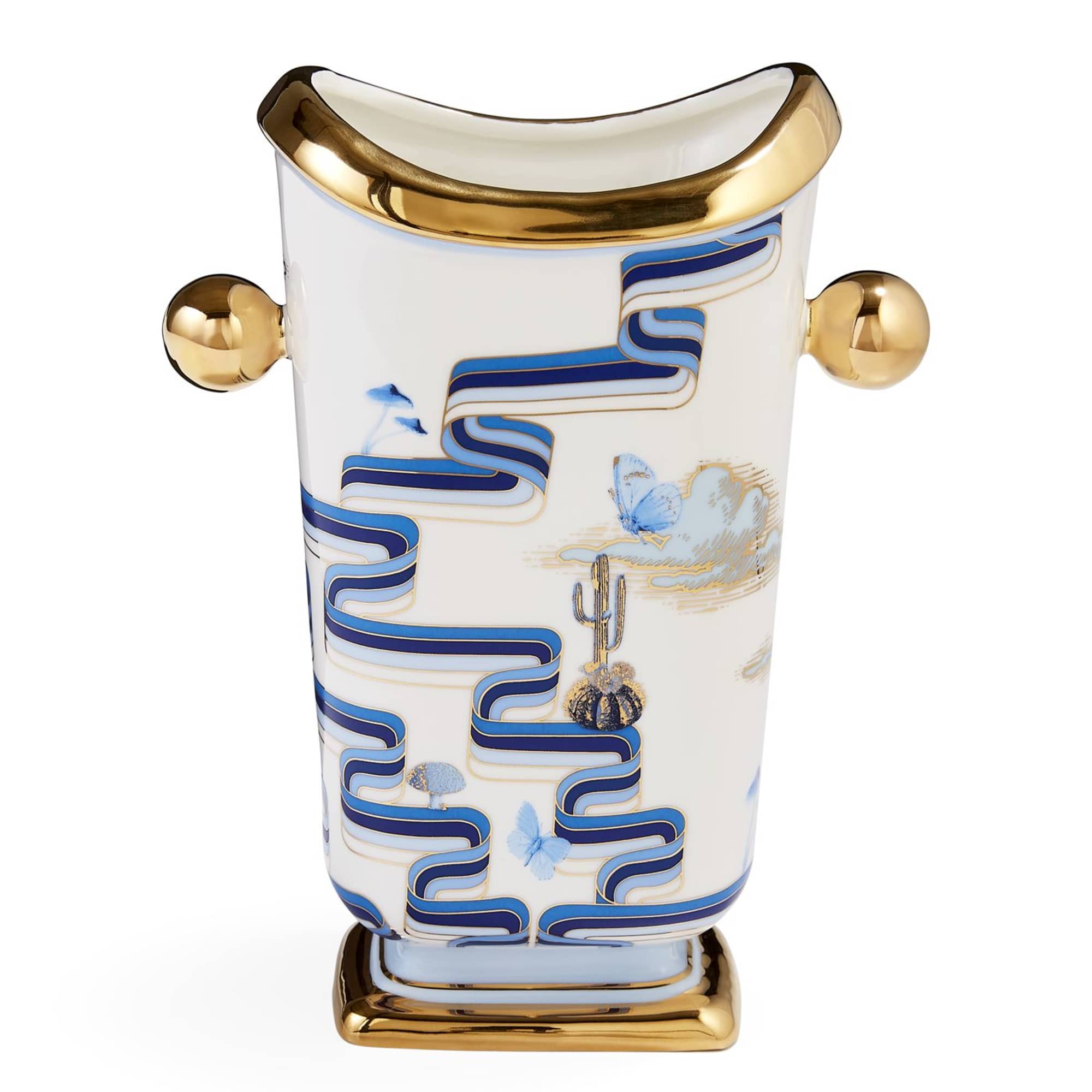 Decorative white ceramic vase with gold accents and blue pattern