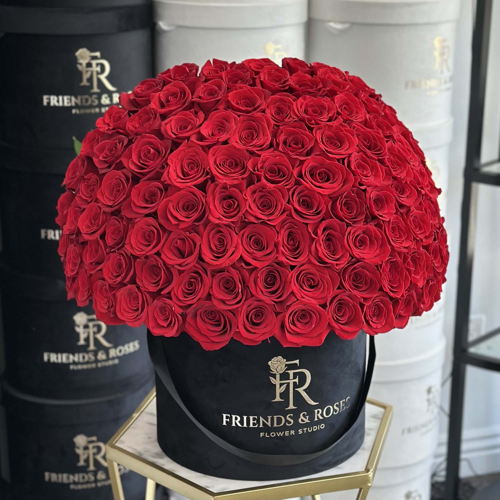 Large dome of red roses in a black hat box, photo 2 of 4