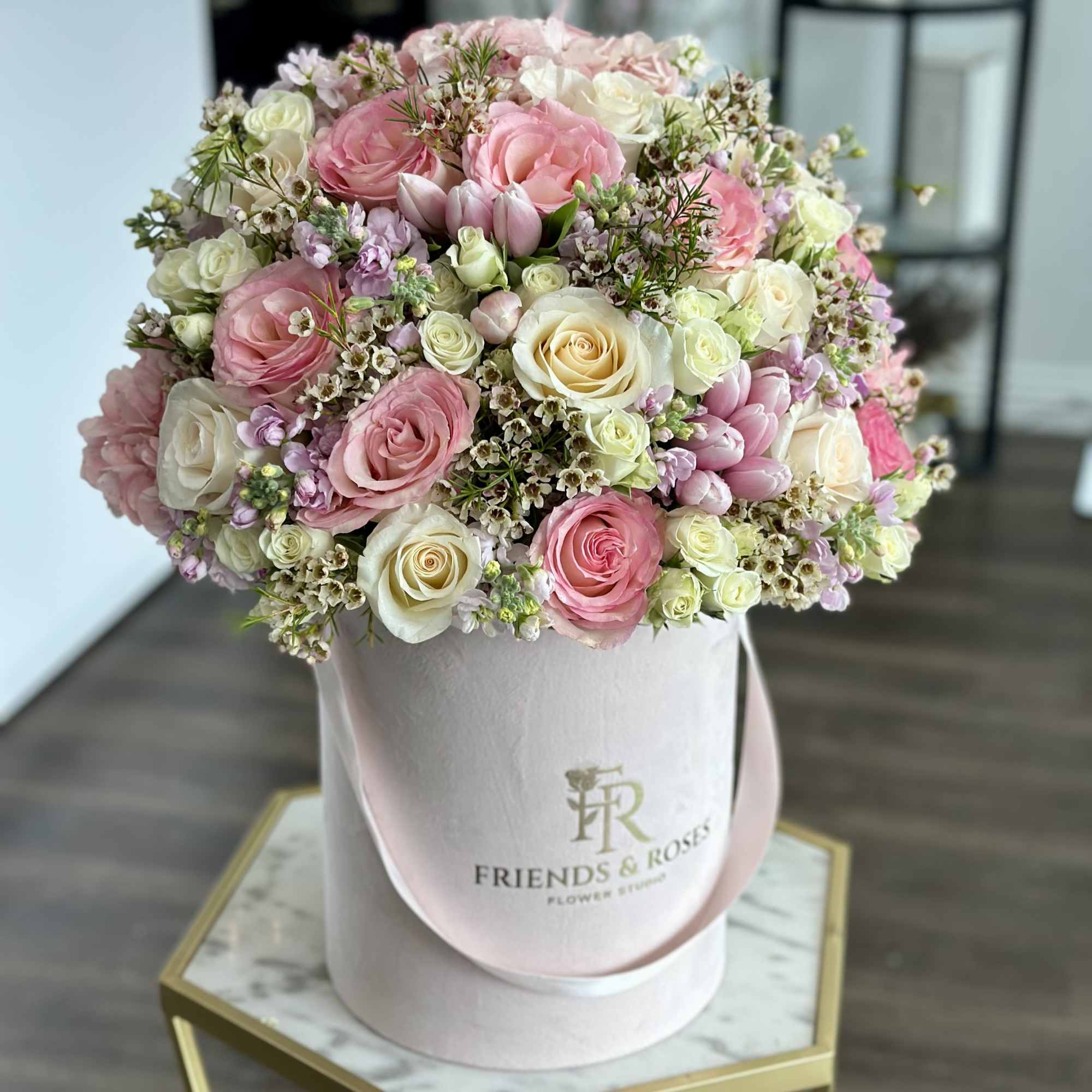 An elegant box arrangement designed in soft blush and ivory tones, overflowing, photo 2 of 2