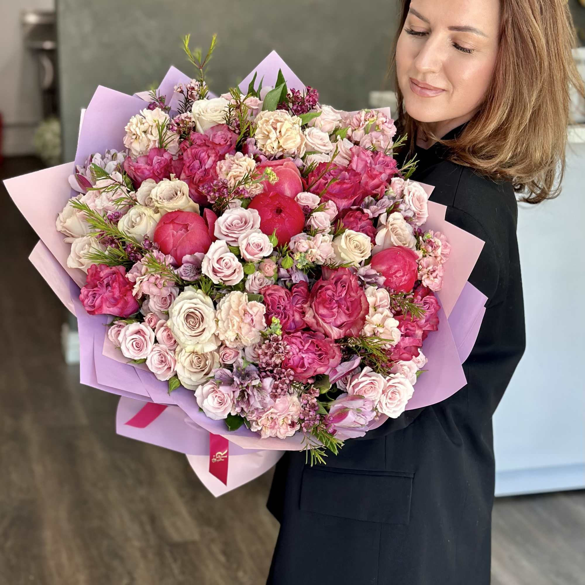 A stunning and colorful arrangement of fine flowers is ideal for any