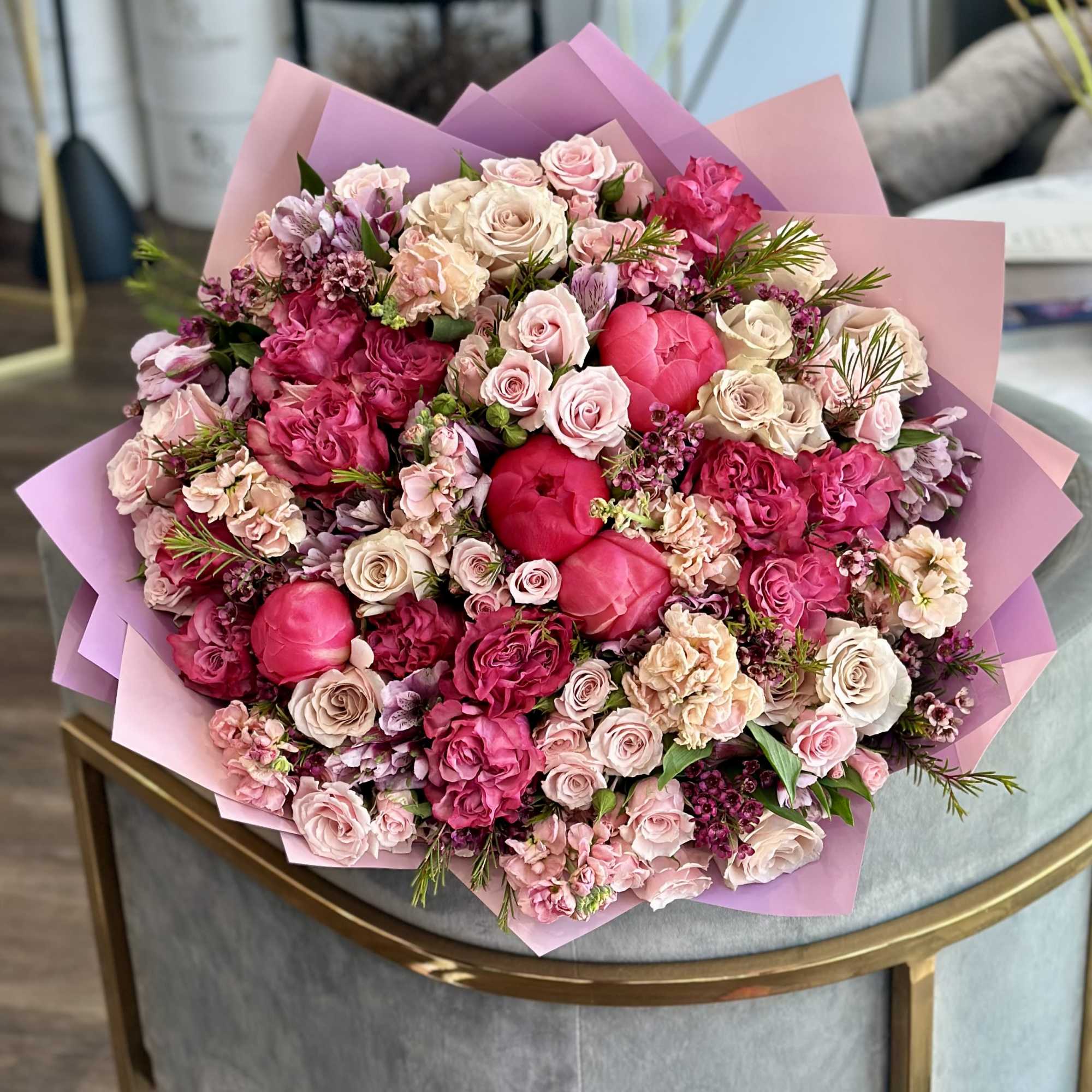 A stunning and colorful arrangement of fine flowers is ideal for any, photo 2 of 3