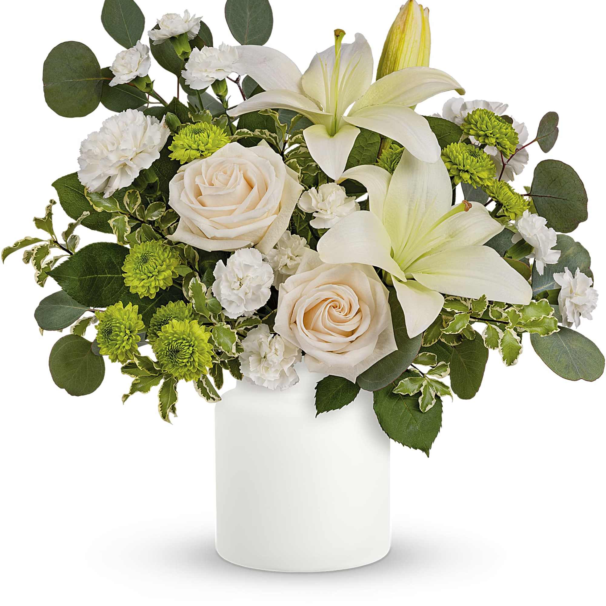 White lilies and pale roses in a white vase with green accents