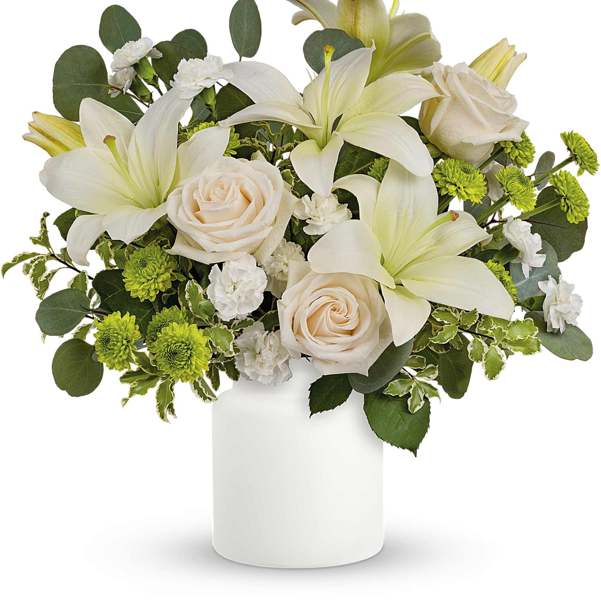 White lilies and pale roses arranged in a white vase