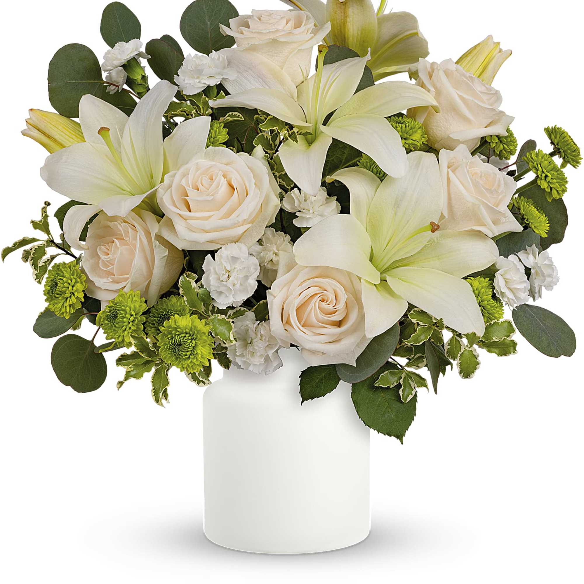 White lilies and pale roses arranged in a white vase