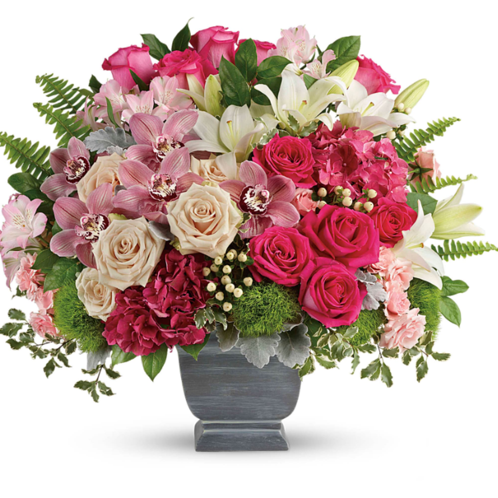 Pink and white mixed flower arrangement in a gray vase