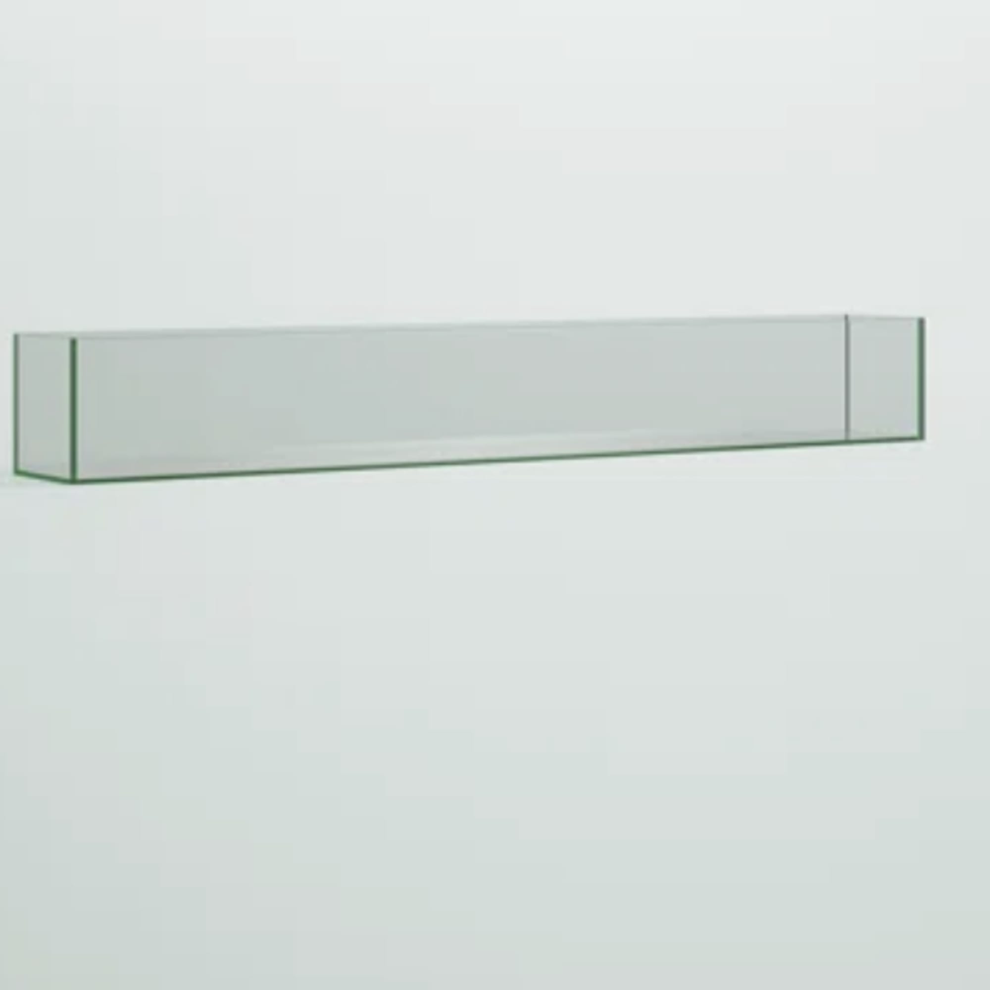 Empty rectangular glass vase on a white surface