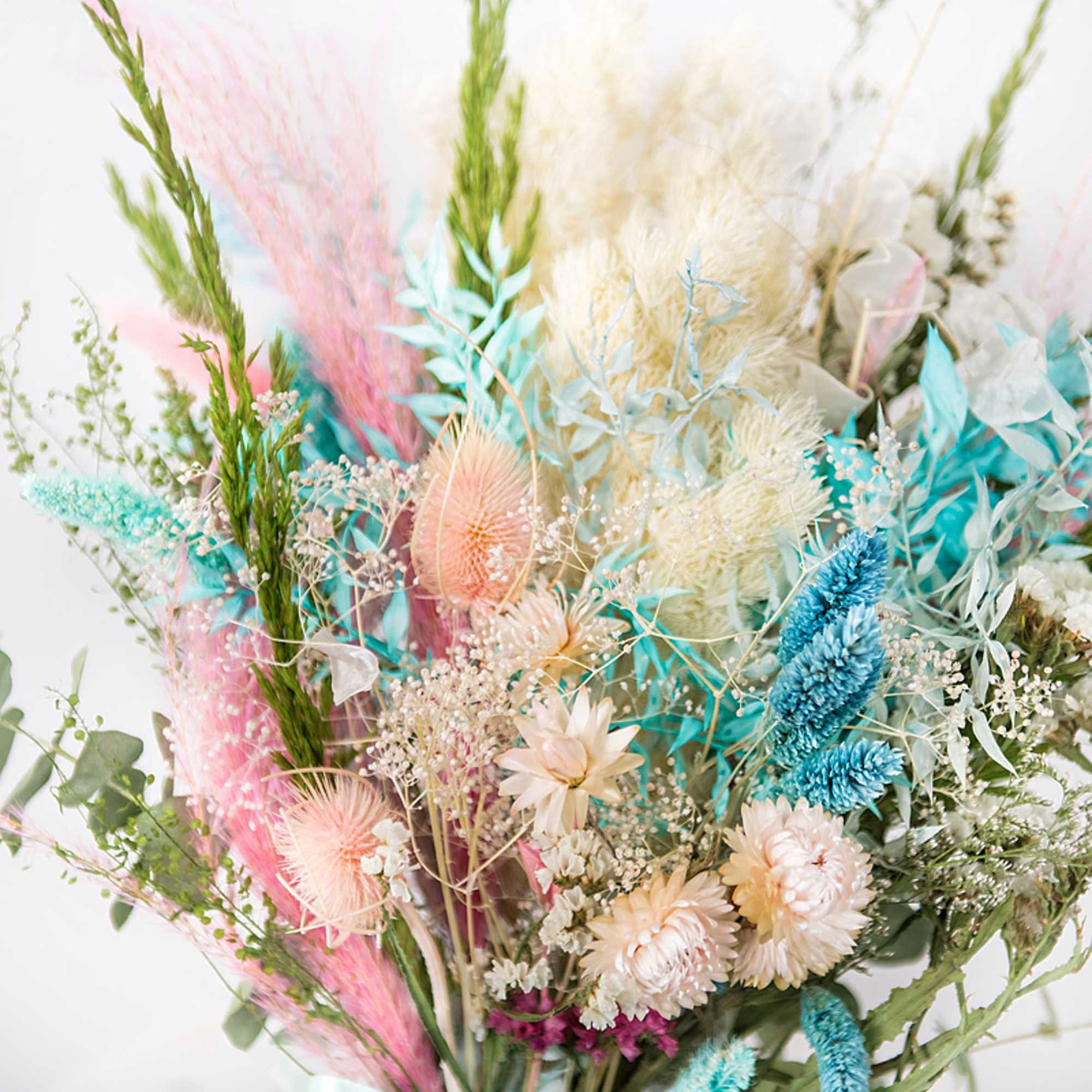 Pastel dried bouquet with blue, pink, and cream textures