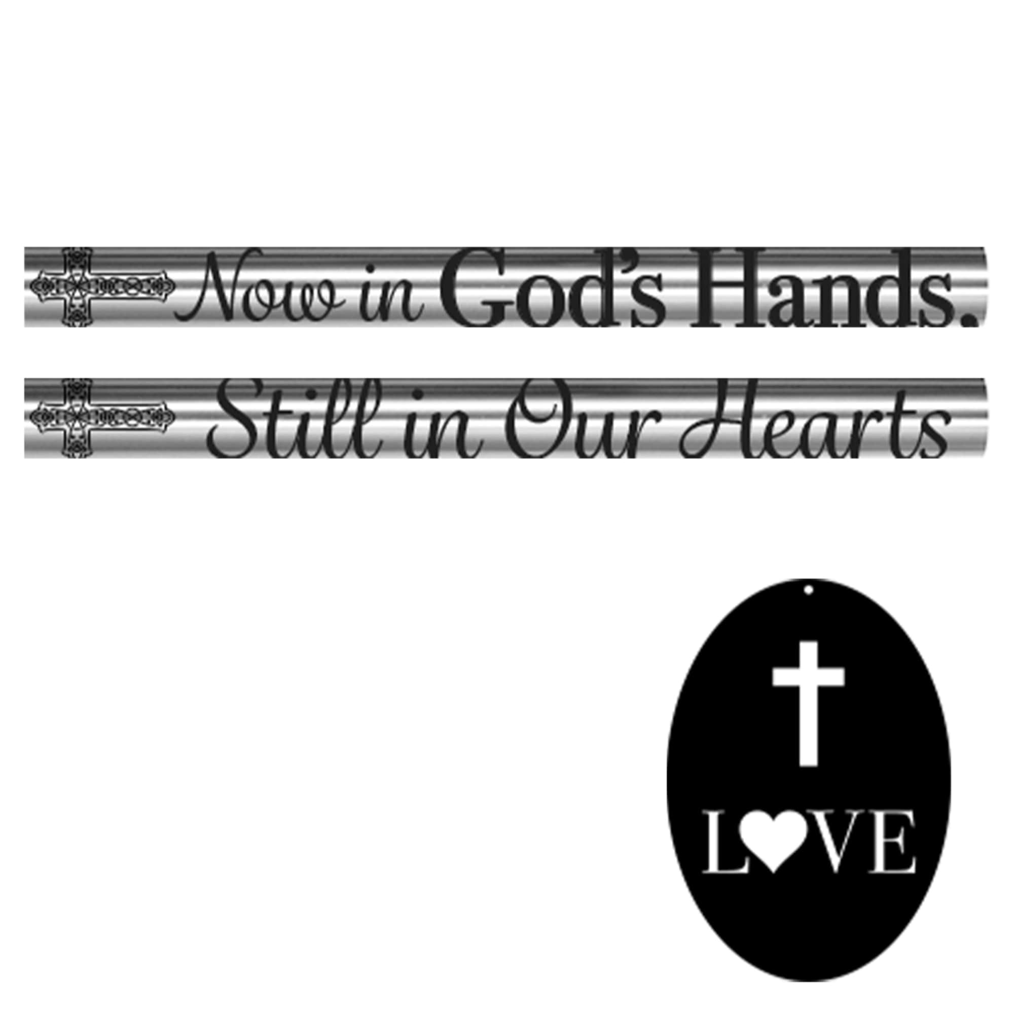 Memorial sign with crosses and the words "Now in God's Hands" and "Still in Our Hearts"