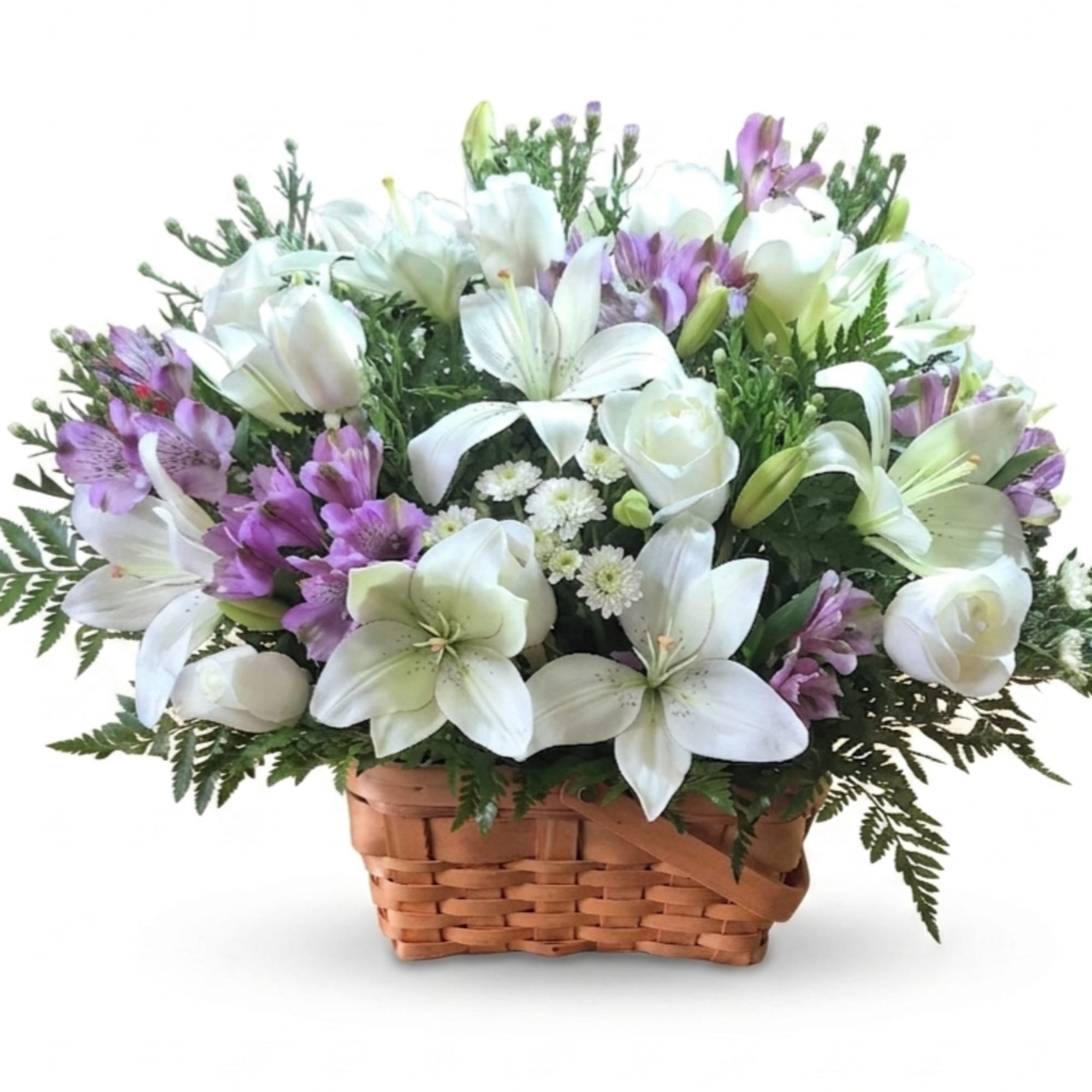 White lilies and white roses take center stage in this airy basket
