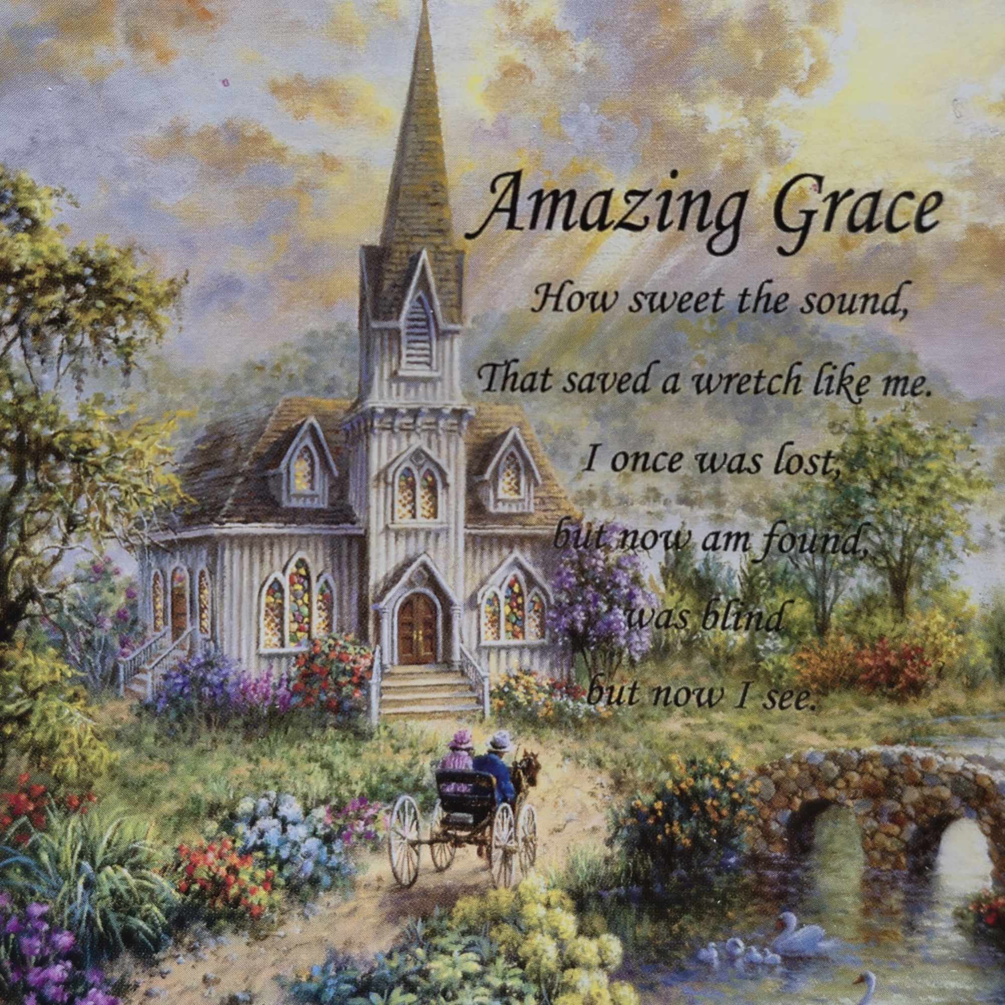Painting of a church with the words Amazing Grace over a garden scene