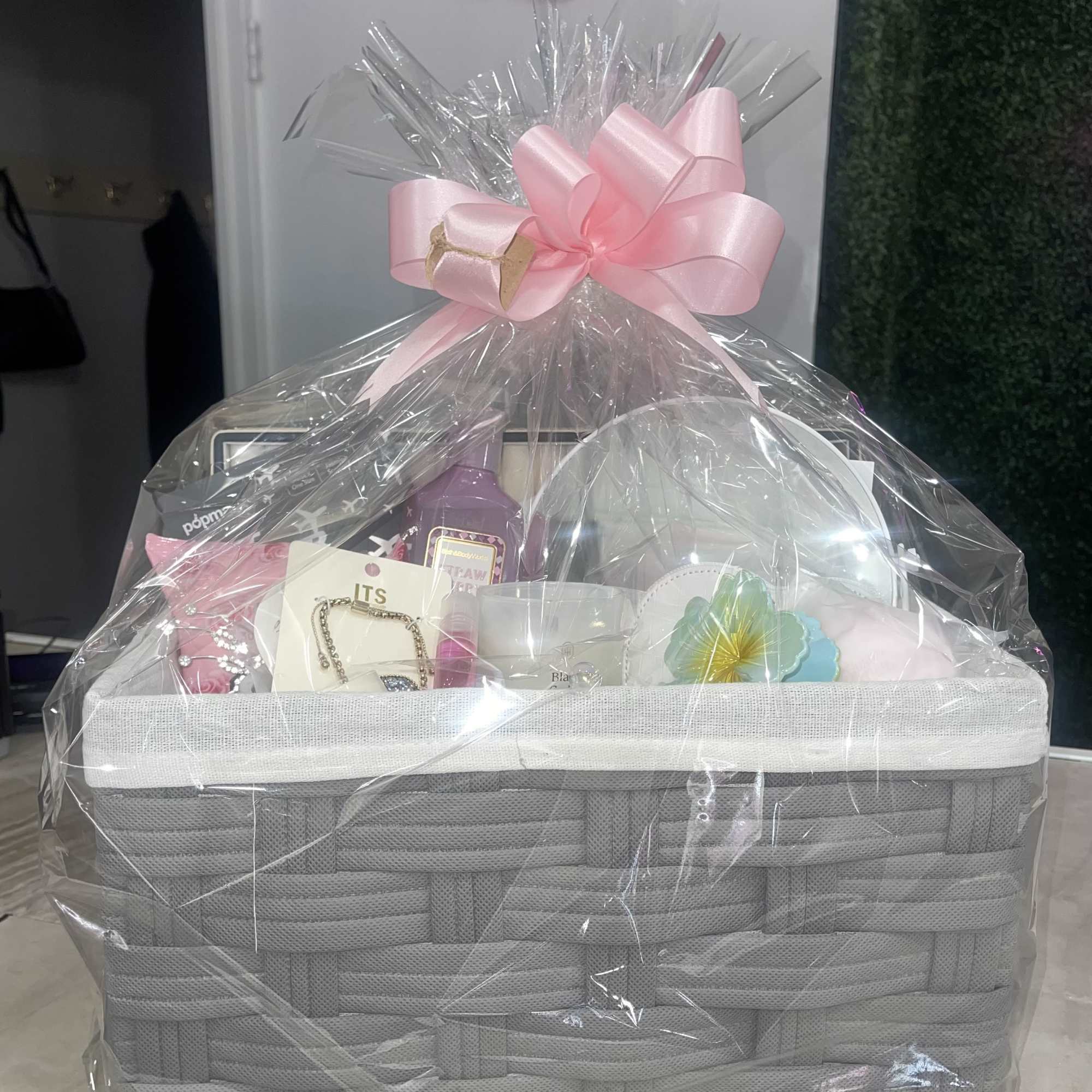 
Each basket arrives filled with assorted self-care and novelty items arranged in