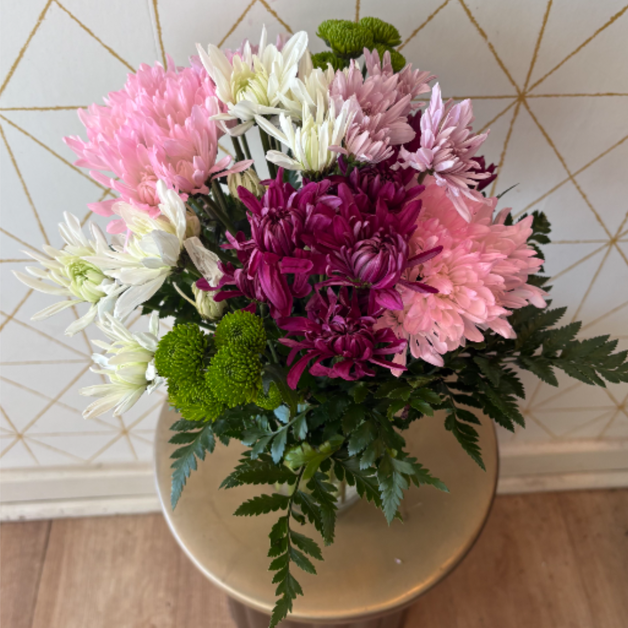 Bright, lively and full of charm, this arrangement features a fresh mix