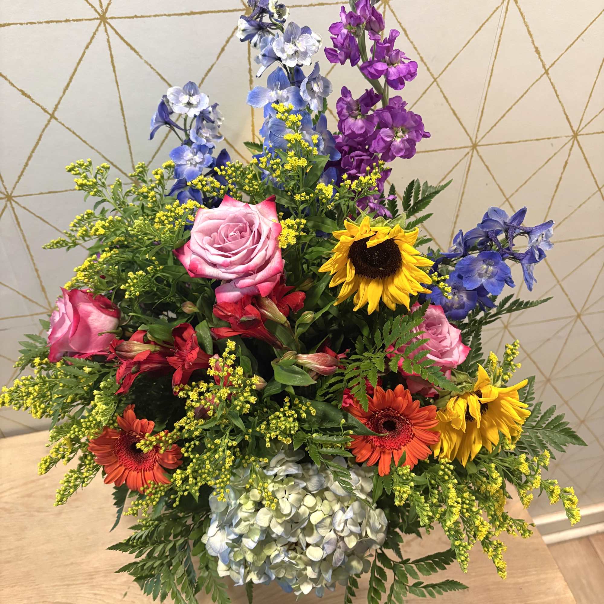 A bright, joyful arrangement that is full of charm. The Mandy features