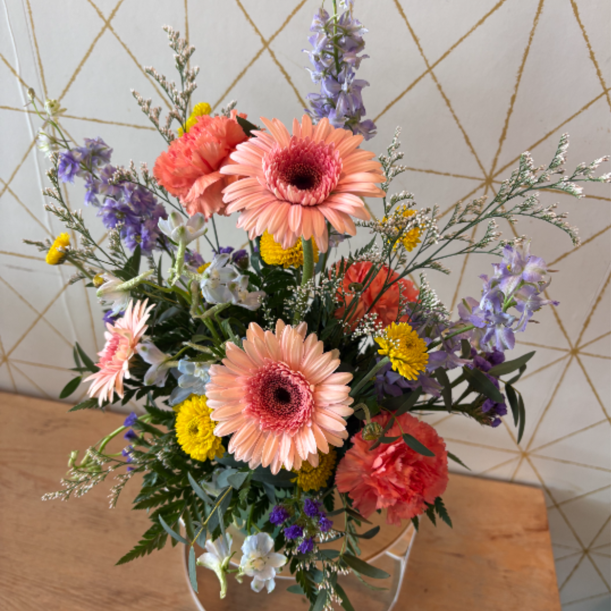 Playful, polished and full of personality, The Kourtney features blush gerbera daisies, photo 3 of 4