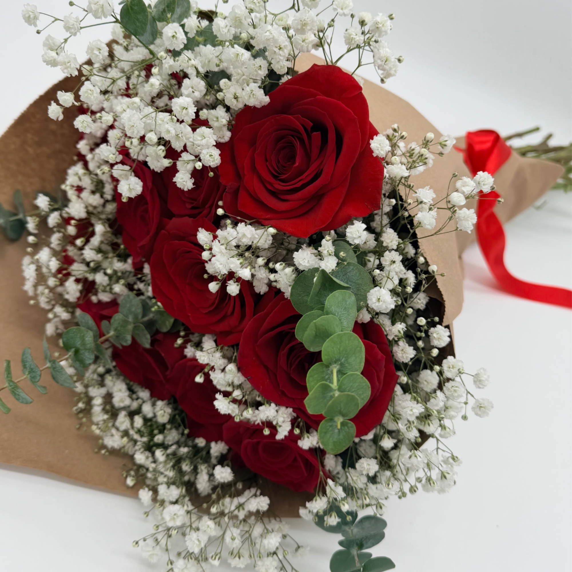 Sweet, classic, and perfect for any occasion. A dreamy wrapped rose bouquet