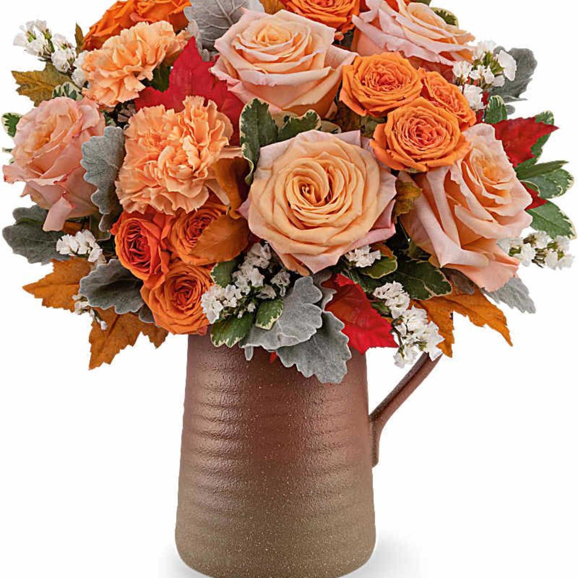 Orange and peach roses with carnations in a brown vase