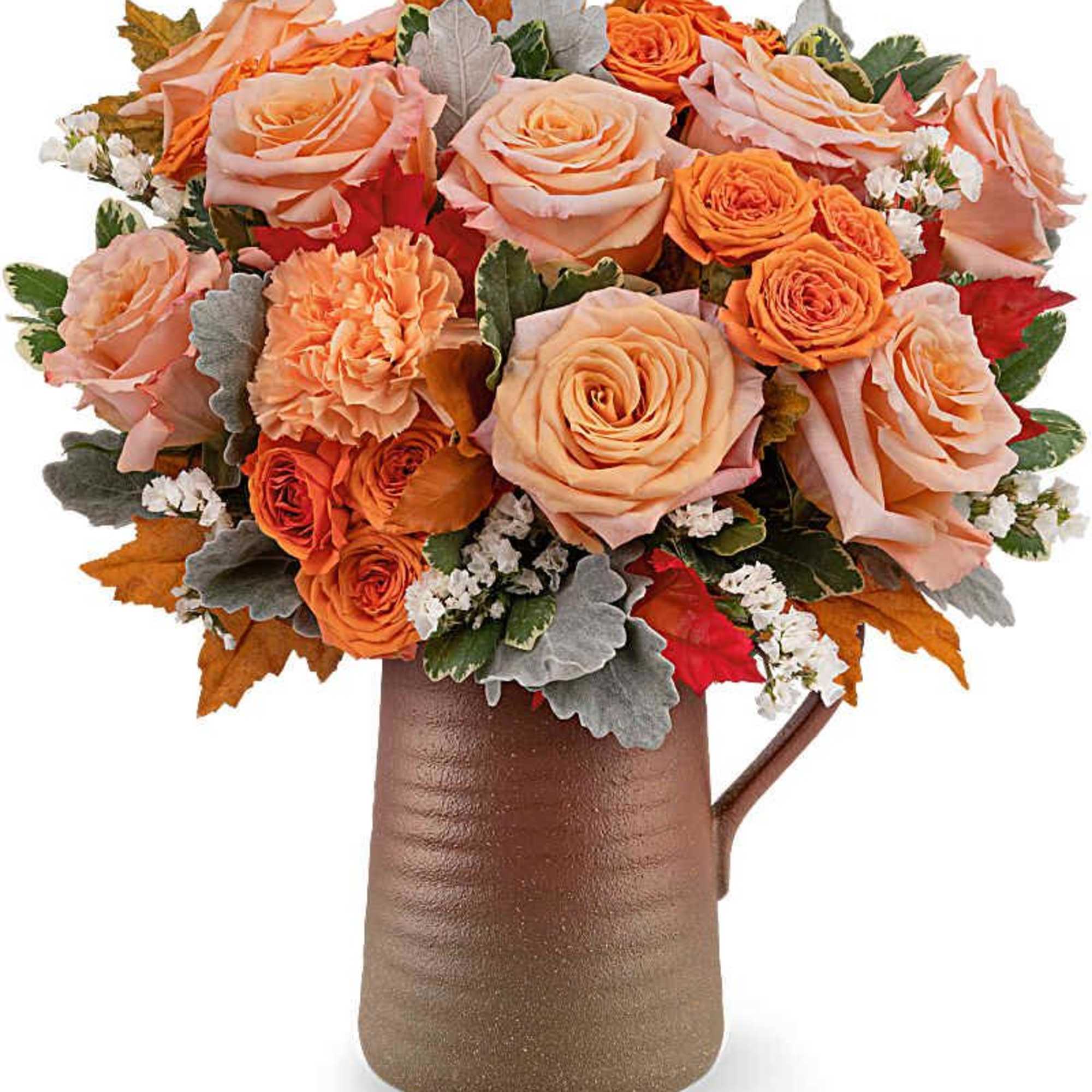 Peach and orange rose bouquet in a brown vase