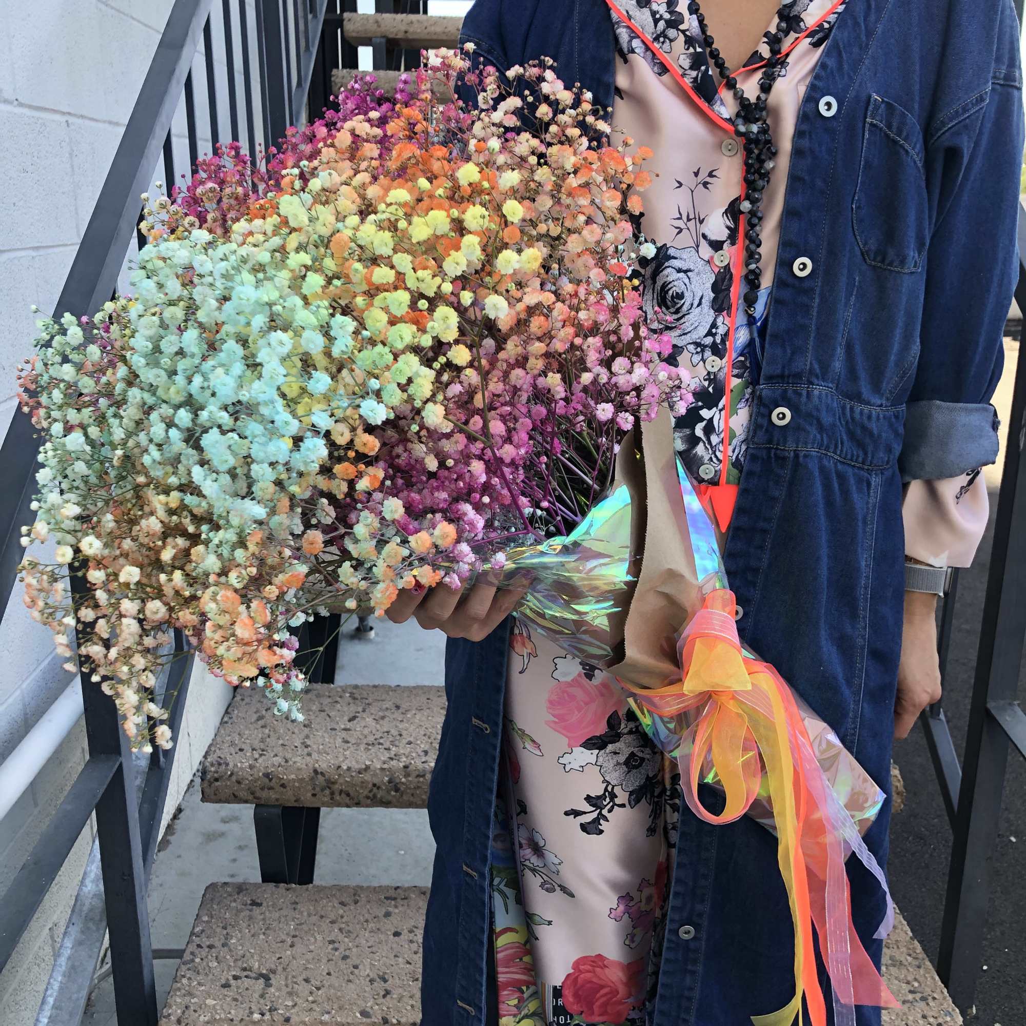 Large bouquet of multicolored baby's breath wrapped with ribbon