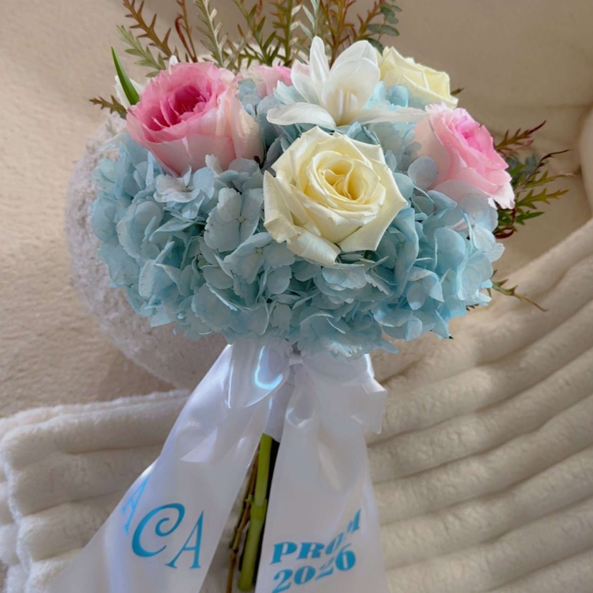 A soft and romantic bouquet featuring sky-blue hydrangeas with blush and ivory, photo 2 of 2