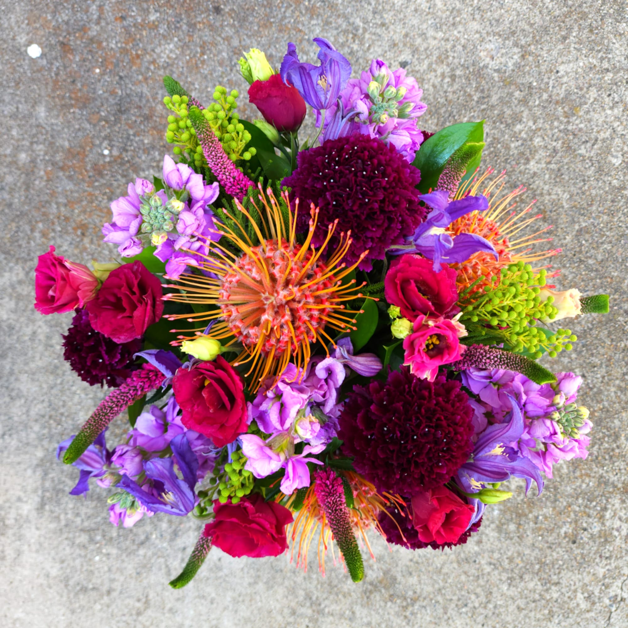 Dramatic + Moody

Deep plum and purple tones create a richly saturated arrangement
